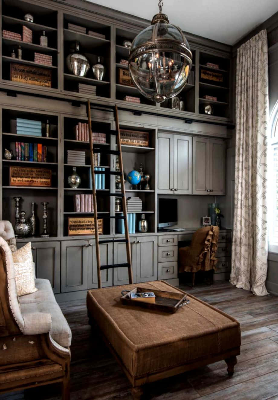 A Home Office With A Large Bookcase And A Ladder Background