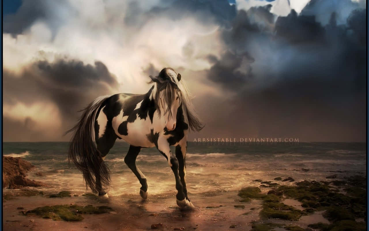 A Horse Standing On The Beach Under A Cloudy Sky Background