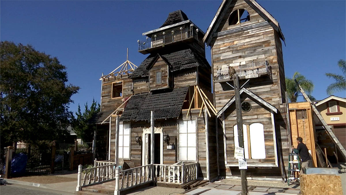 A House Made Out Of Wood And A Staircase Background