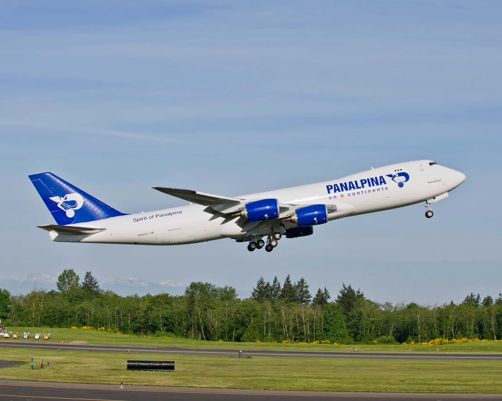 A Huge Jumbo Jet Take Off Under The Cloudy Sky Background