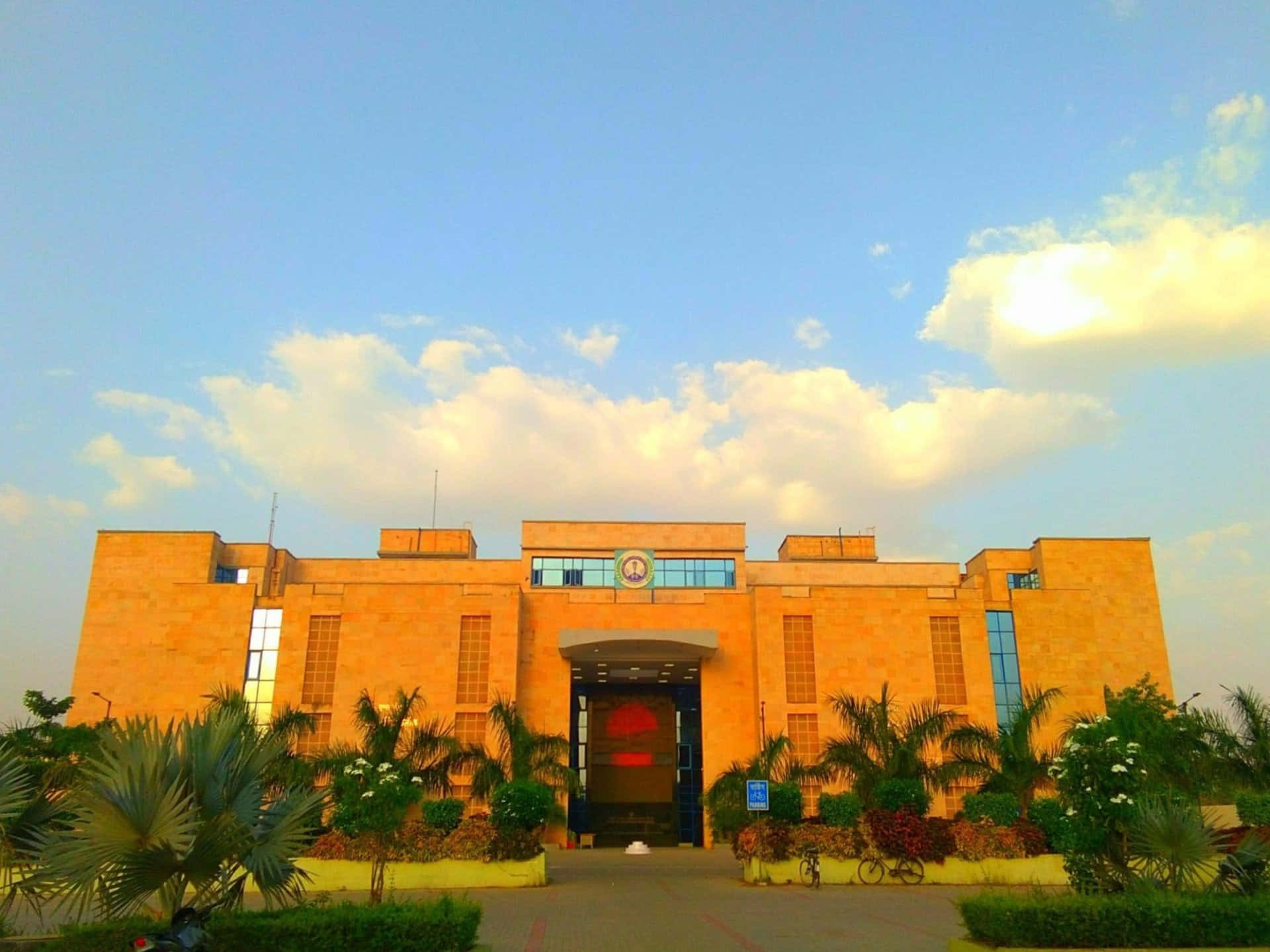 A I I M S Institute Facade Sunset Background