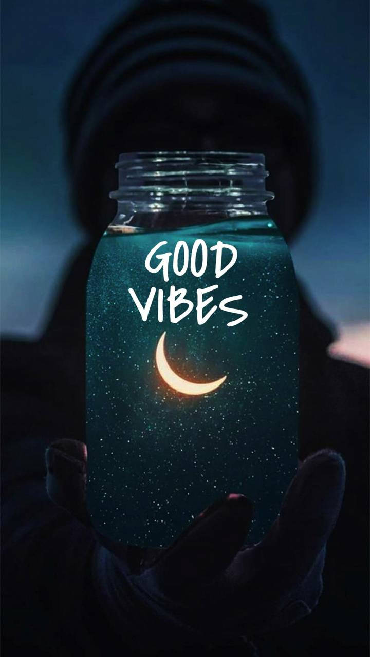 A Jar With The Words Good Vibes In It Background