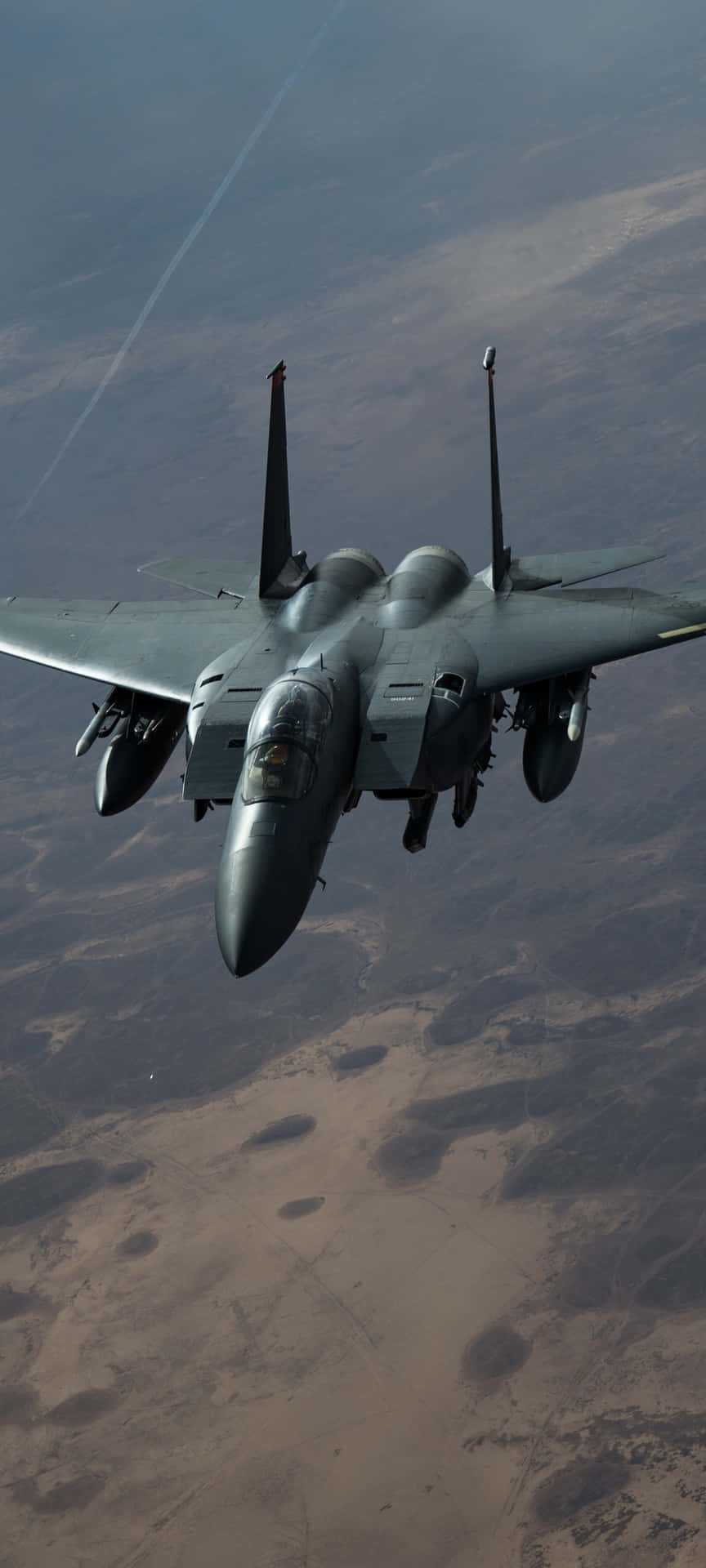 A Jet Flying In The Sky Background