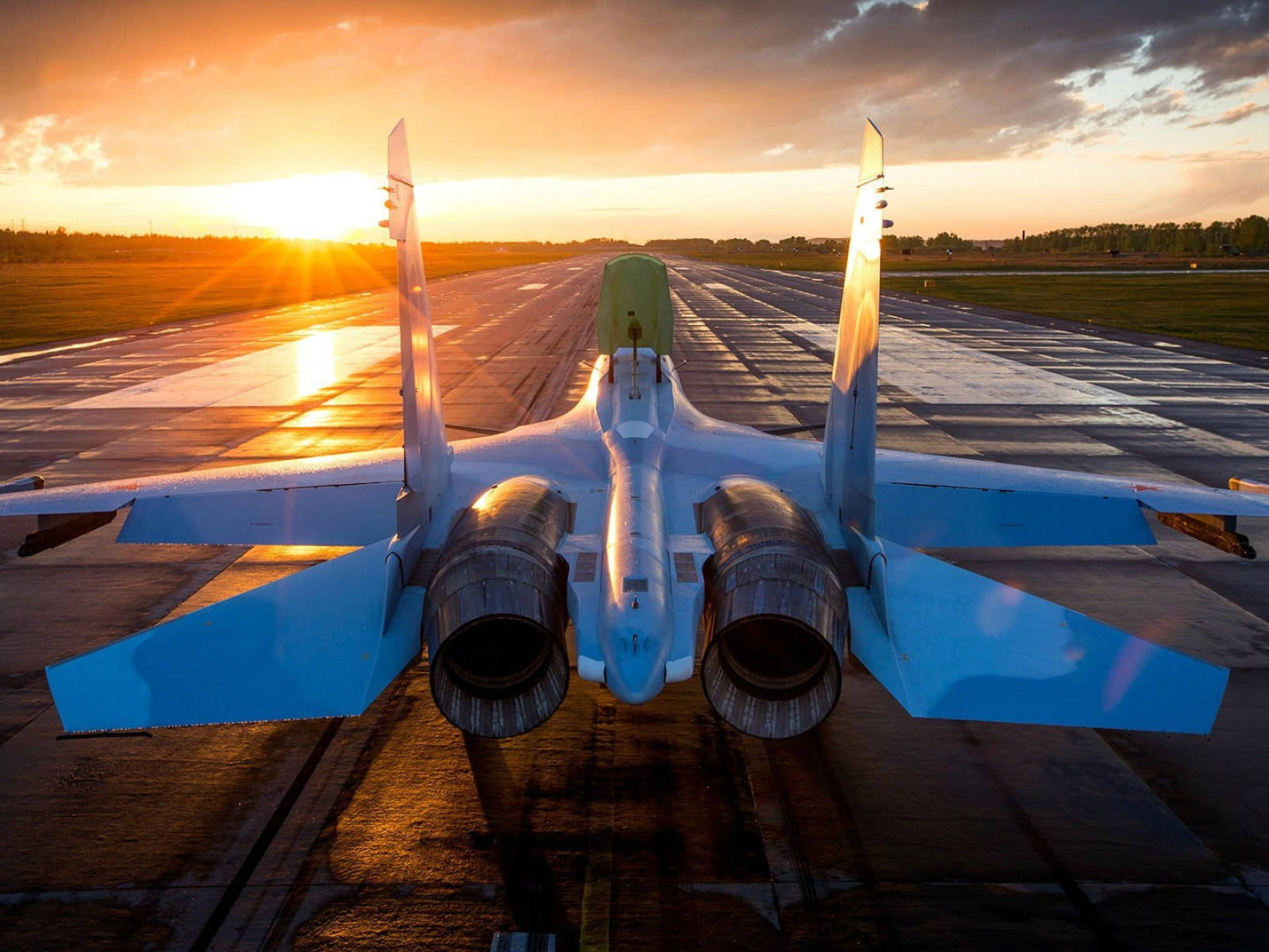 A Jet Is On The Runway Background