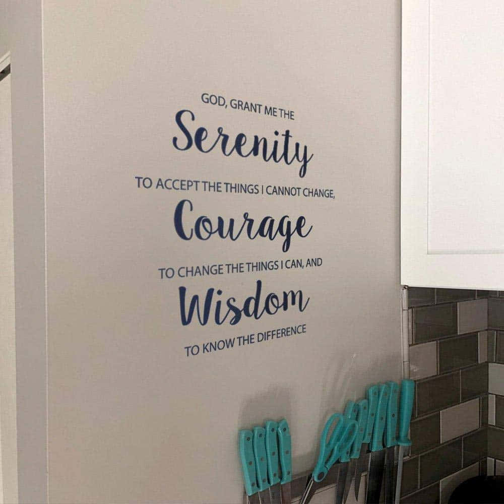 A Kitchen With A Wall Decal Saying,'god Gave Me Serenity To The Courage And Wisdom To Change