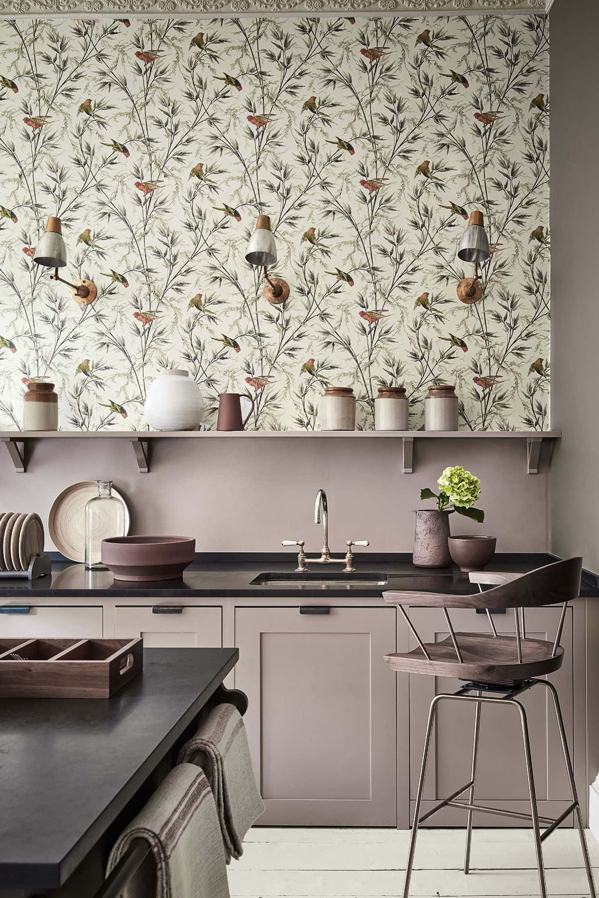 A Kitchen With A Wallpaper And Chairs Background