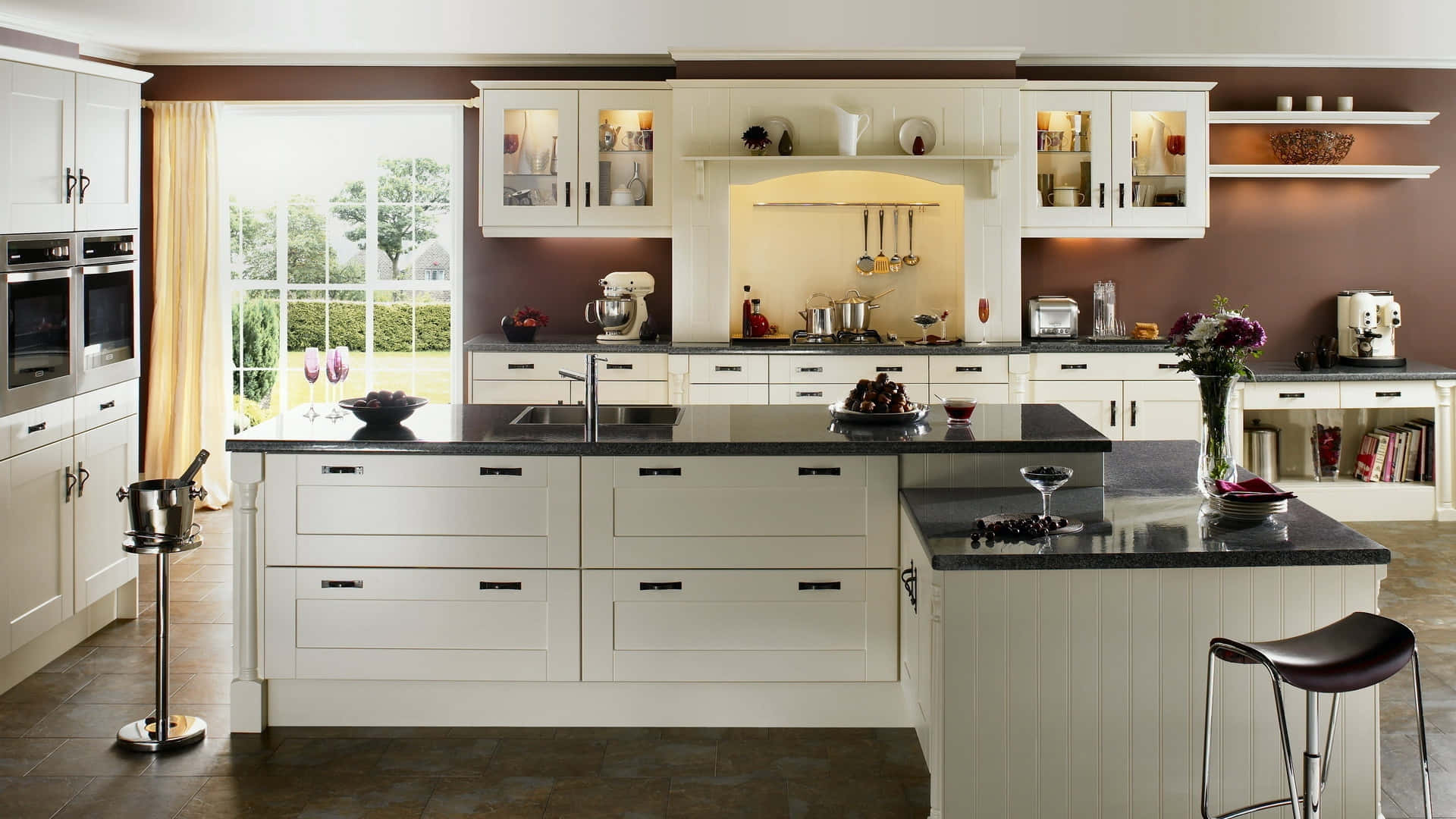 A Kitchen With A White Island And Stools Background