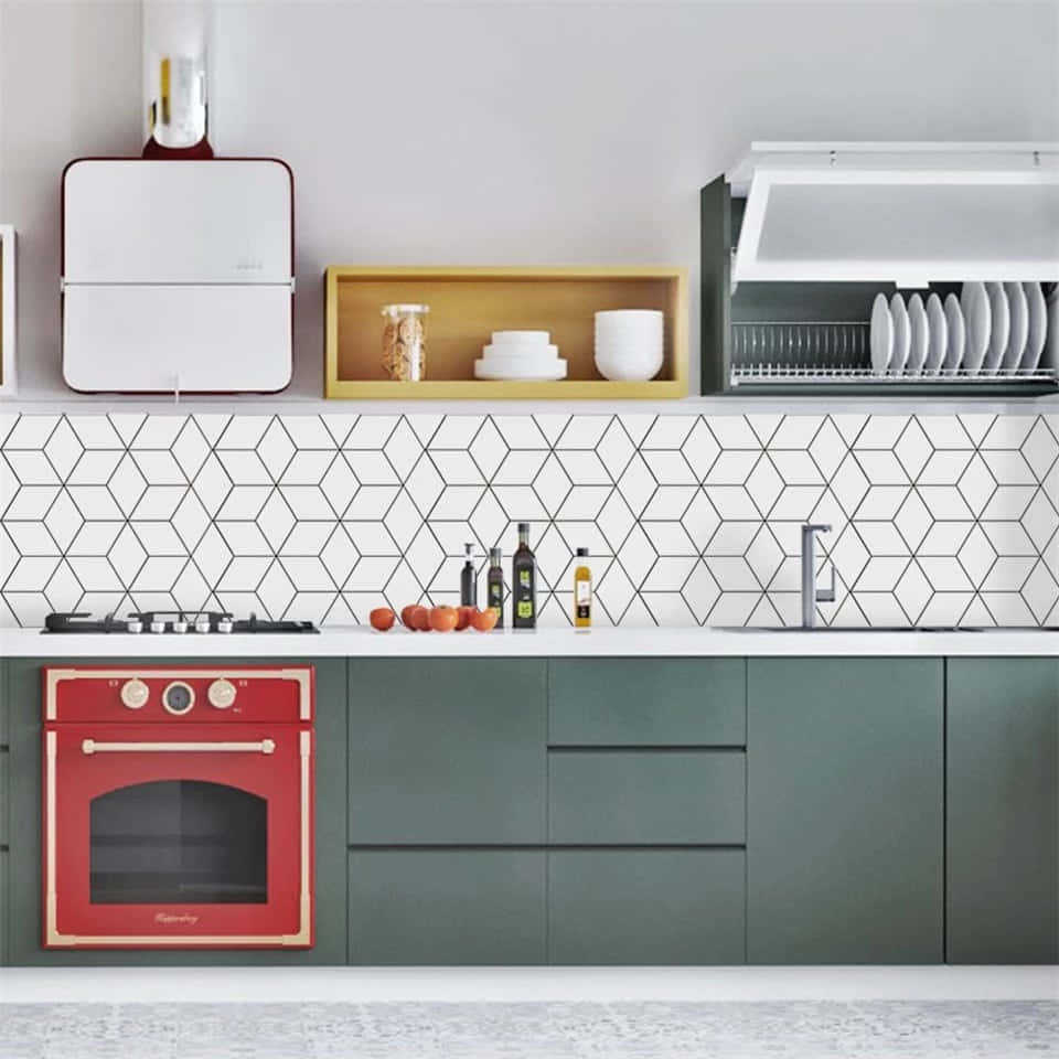 A Kitchen With Green Cabinets And A Red Oven Background