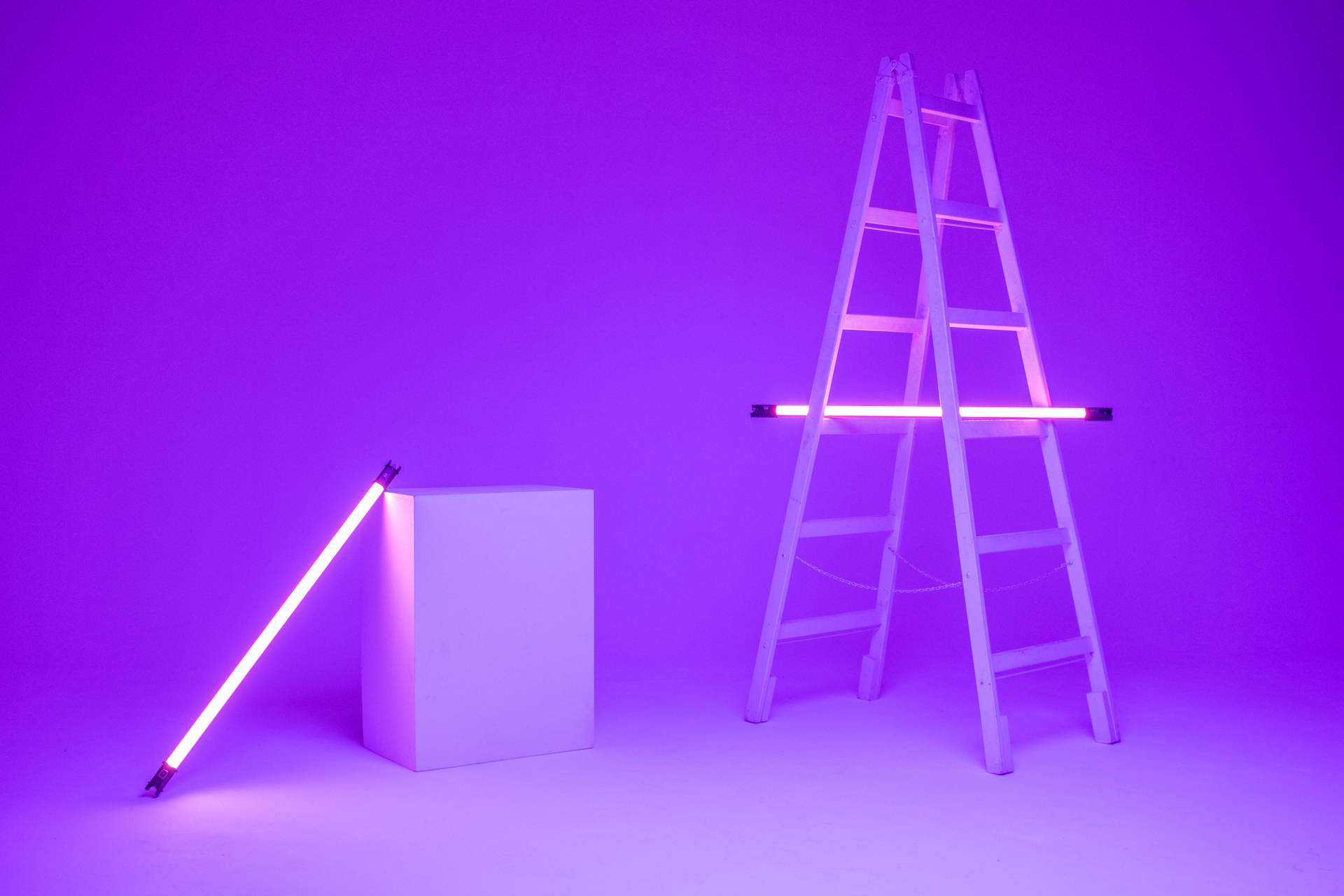 A Ladder With A Purple Light And A Ladder With A Purple Light Background