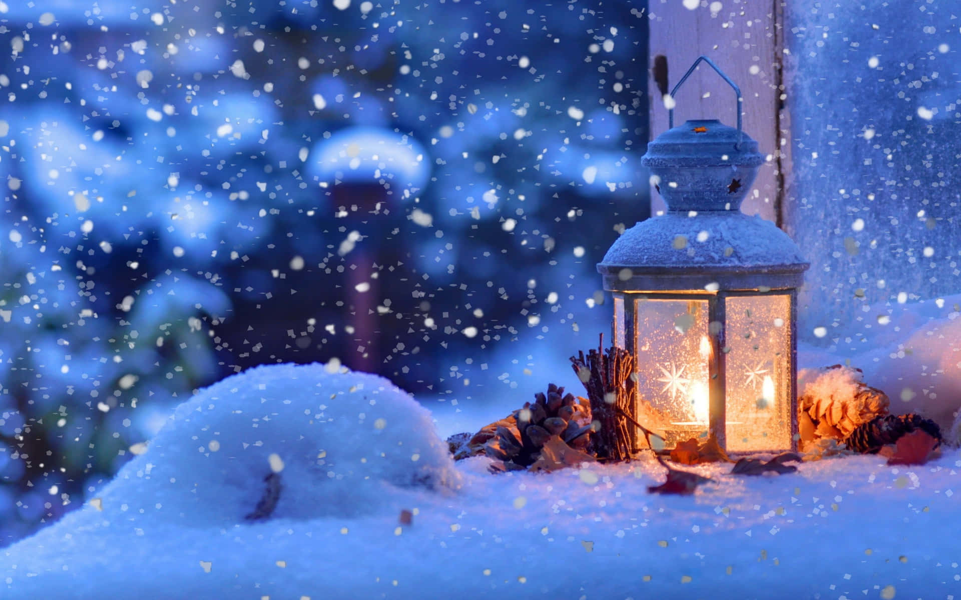 A Lantern Is Sitting On A Snow Covered Window Background
