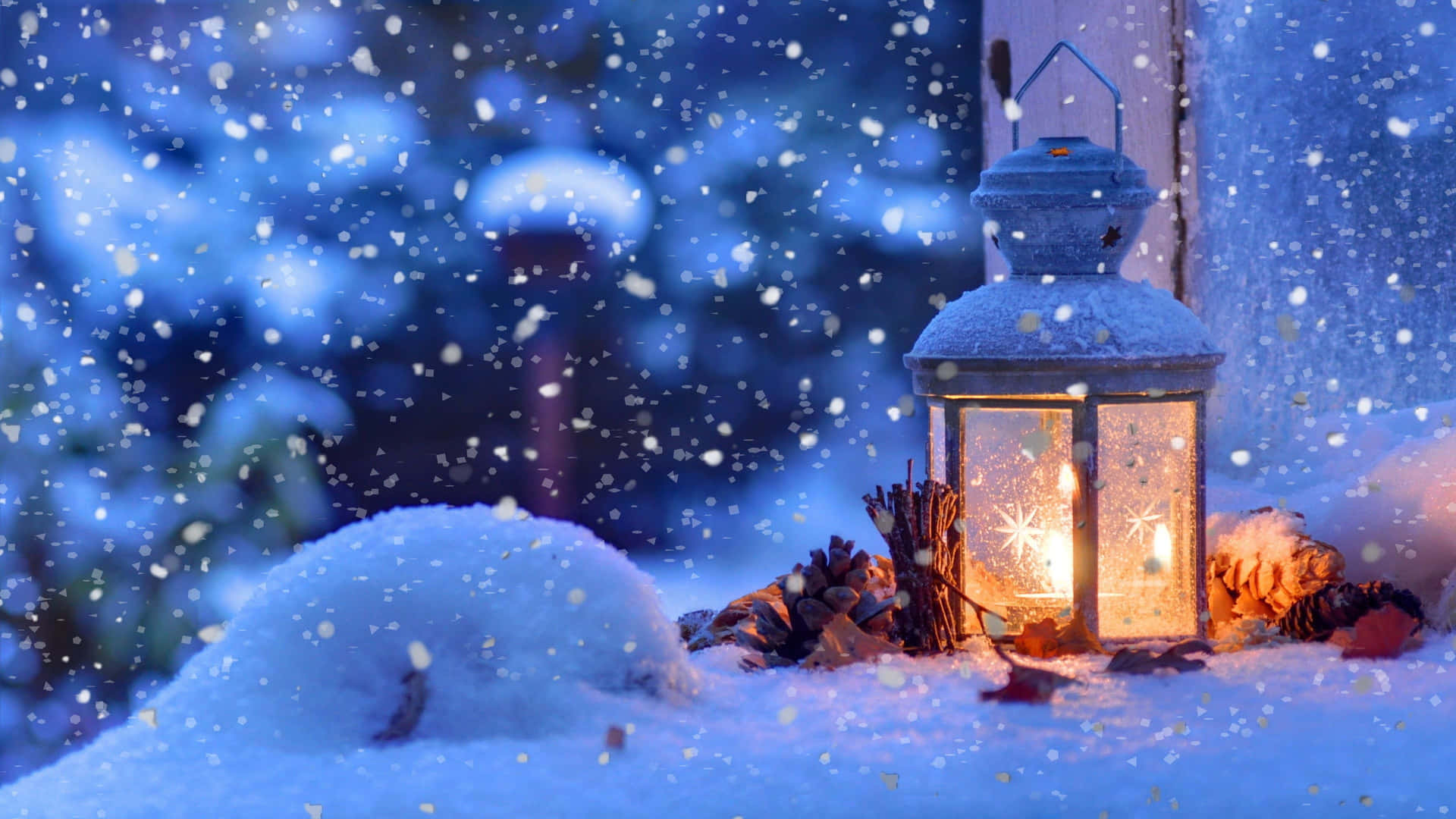 A Lantern Is Sitting On A Snow Covered Window Sill Background