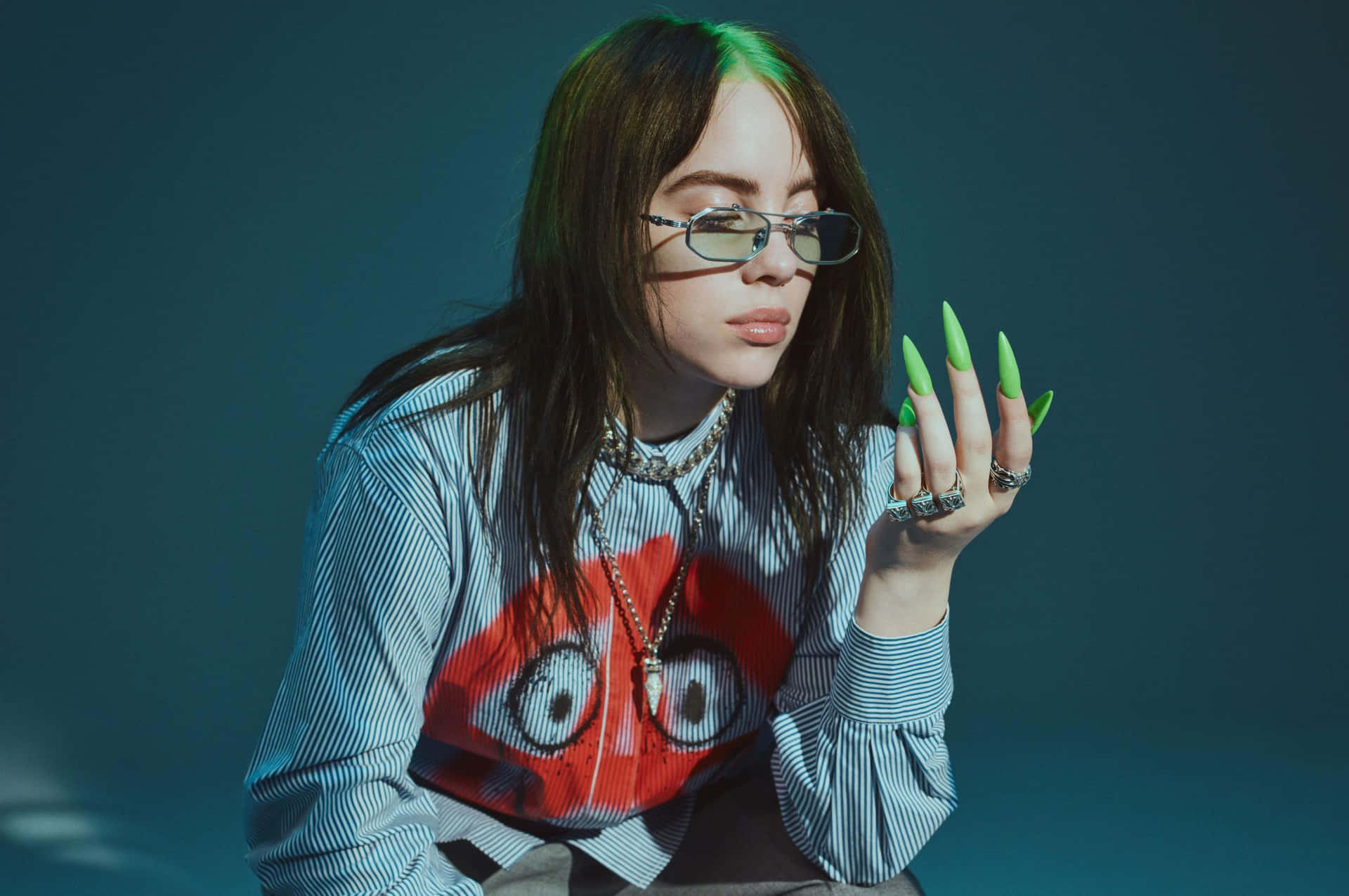 A Laptop Featuring A Musical Motif Of Billie Eilish Background