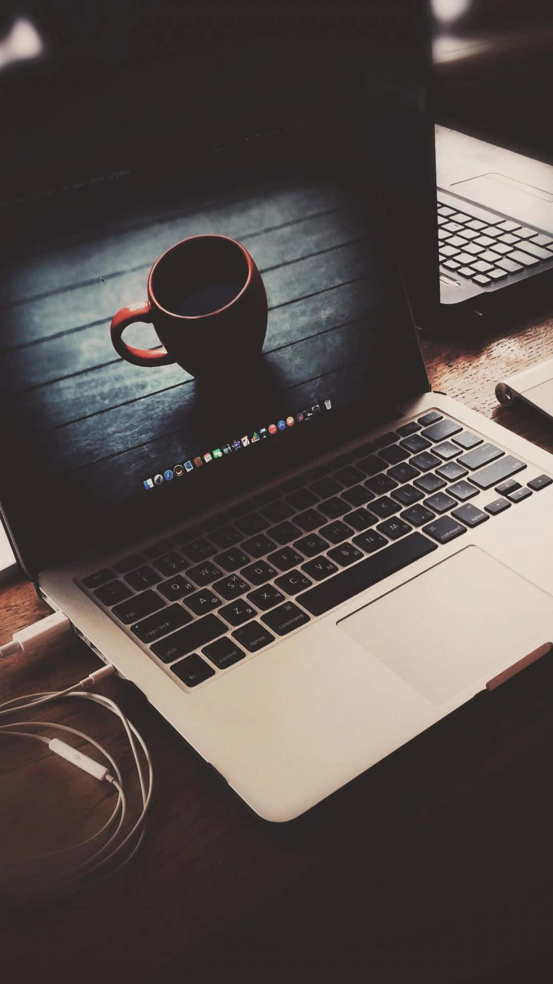 A Laptop On A Table Background