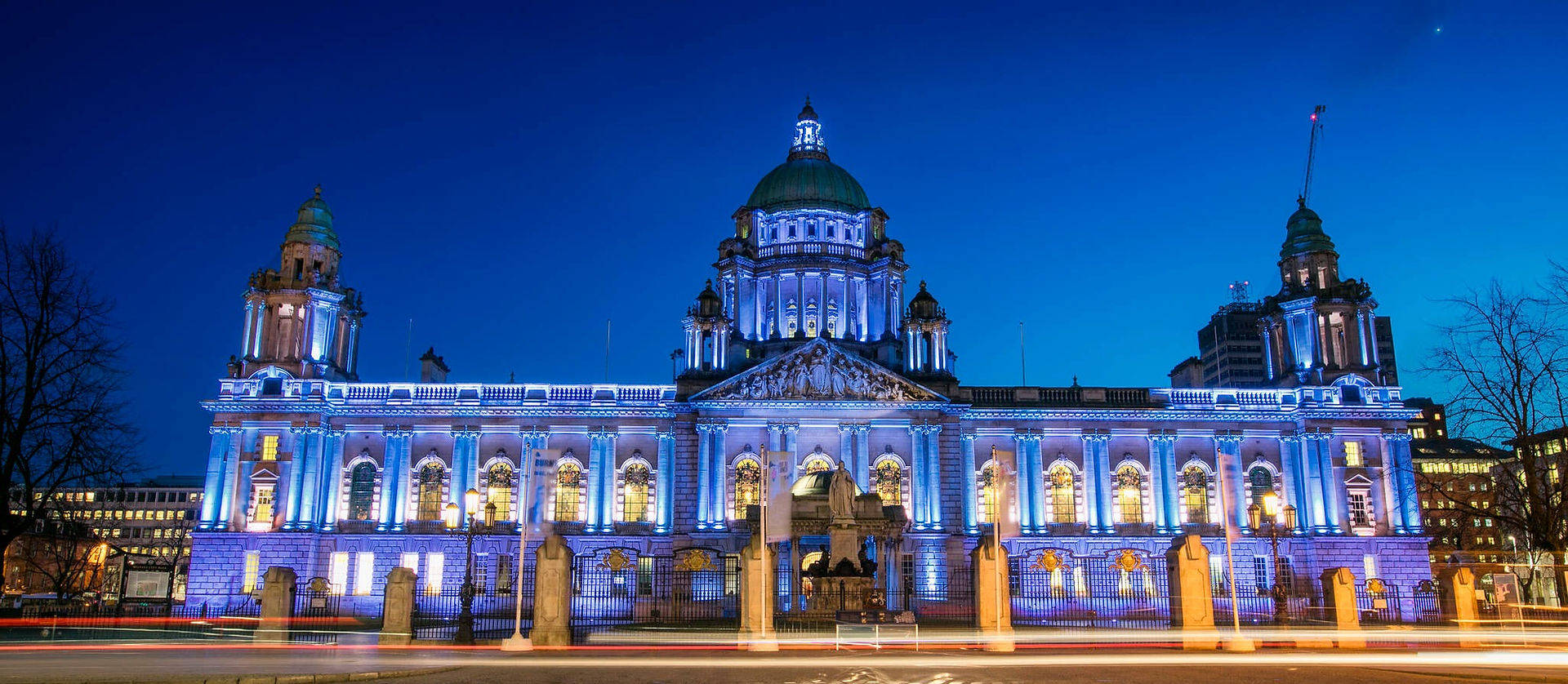 A Large Building Lit Up At Night