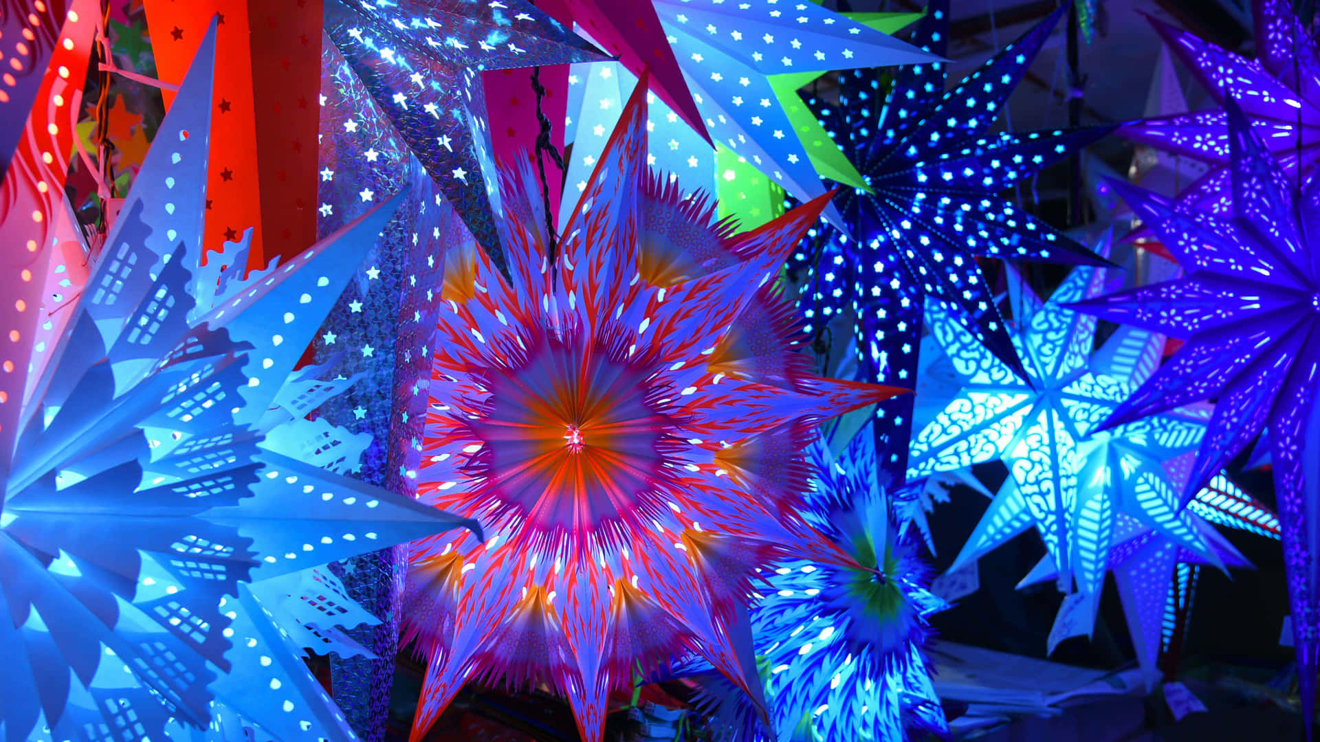 A Large Group Of Colorful Paper Stars Background