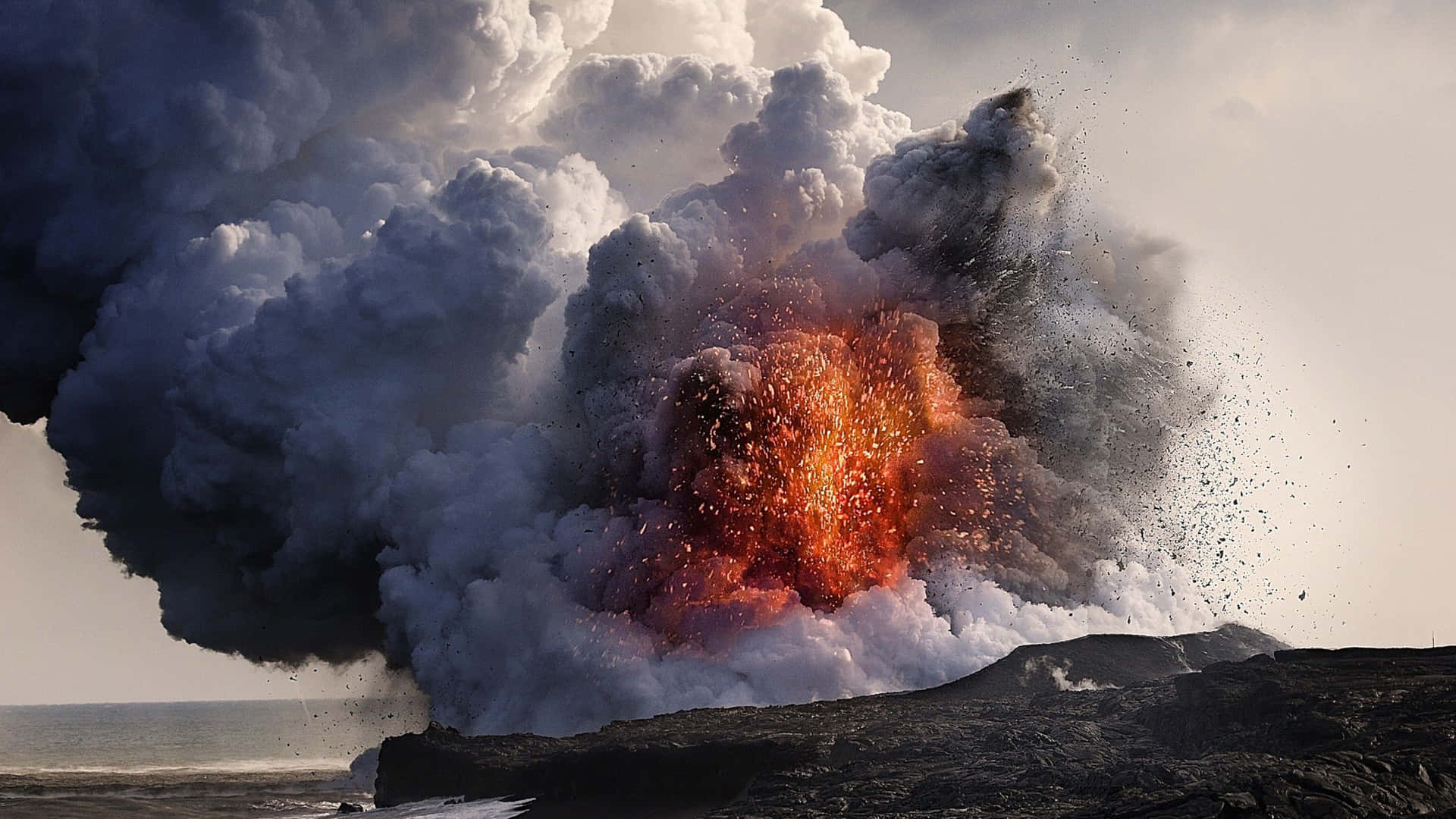 A Large Lava Eruption Is Coming Out Of The Ocean Background