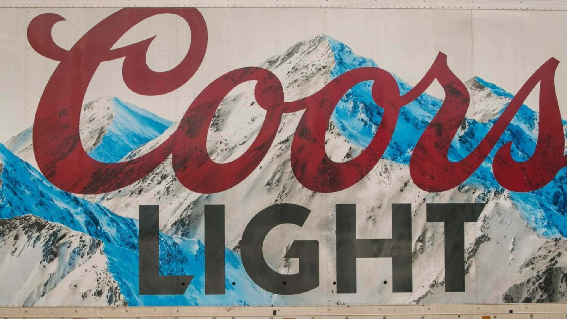 A Large Poster With The Words Coors Light On It Background