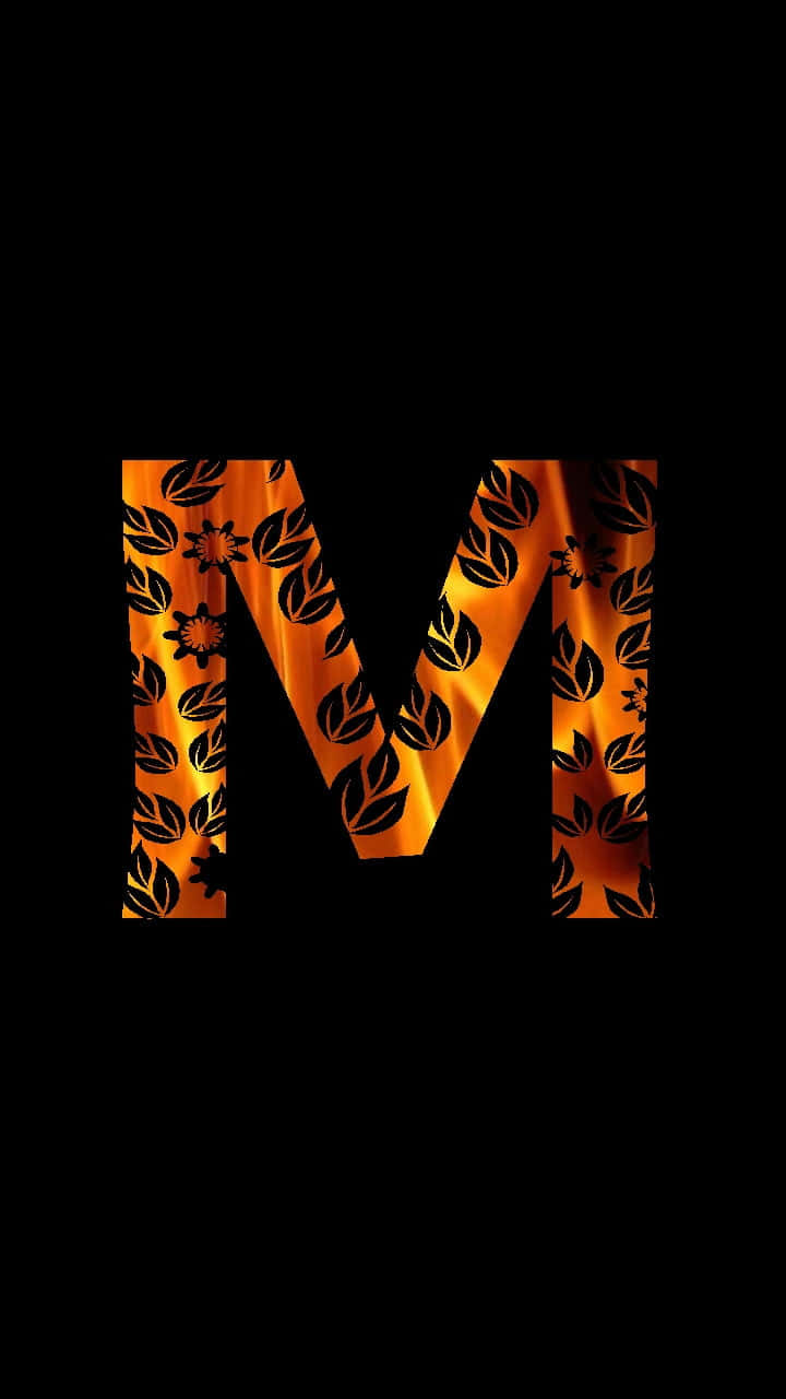 A Letter M With A Flame On It Background