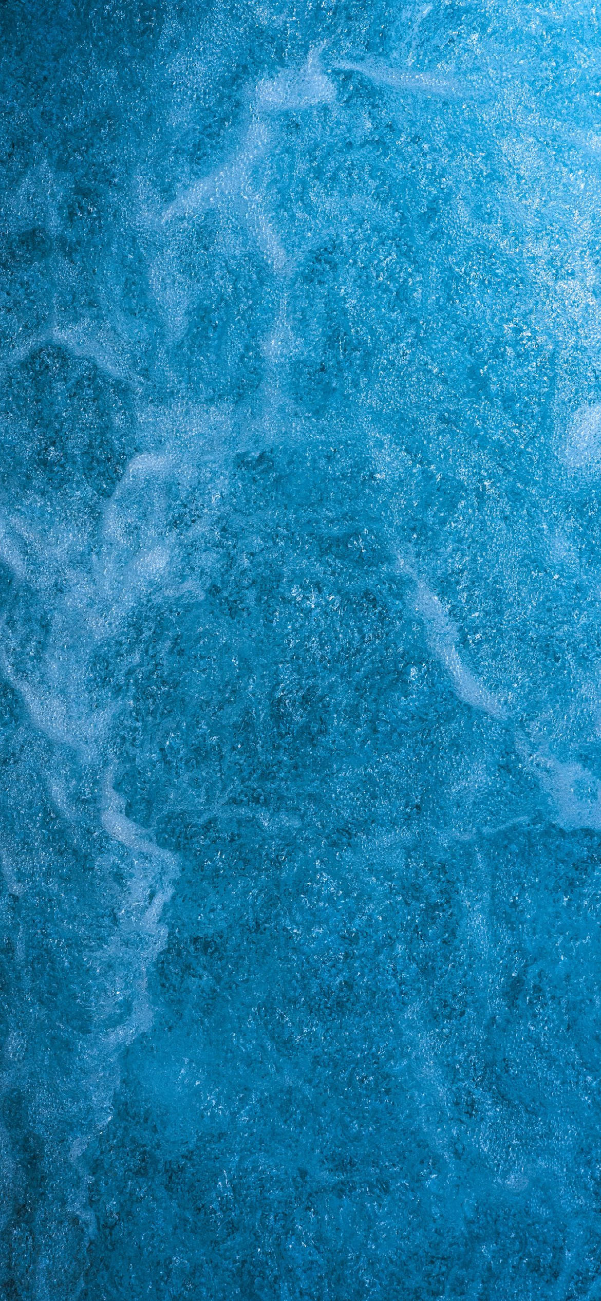 A Light Blue Phone With Fizzy Texture Background