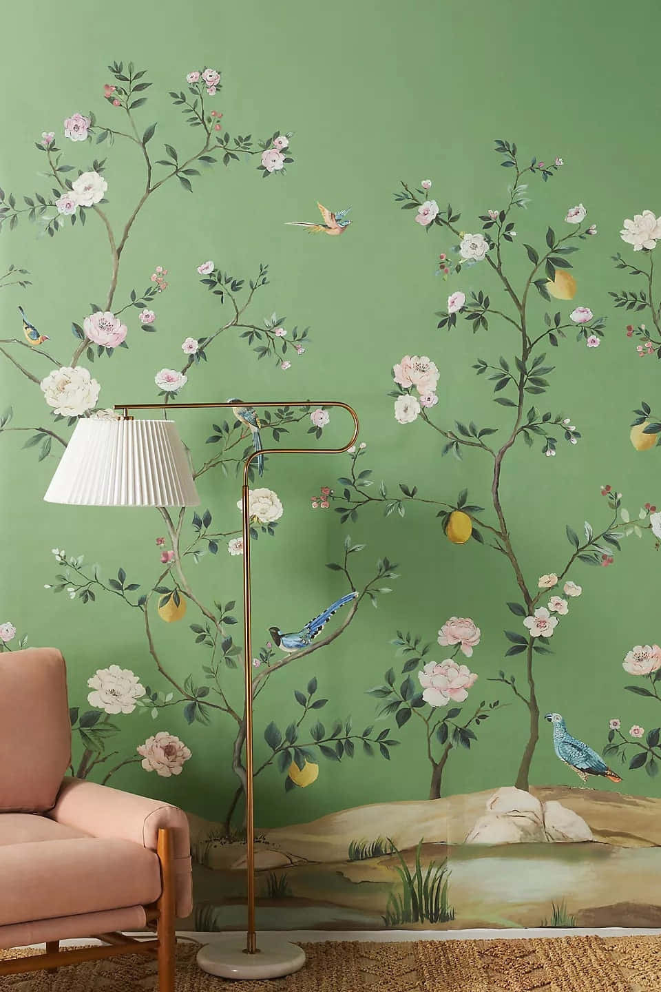 A Living Room With A Green Wall And A Chair