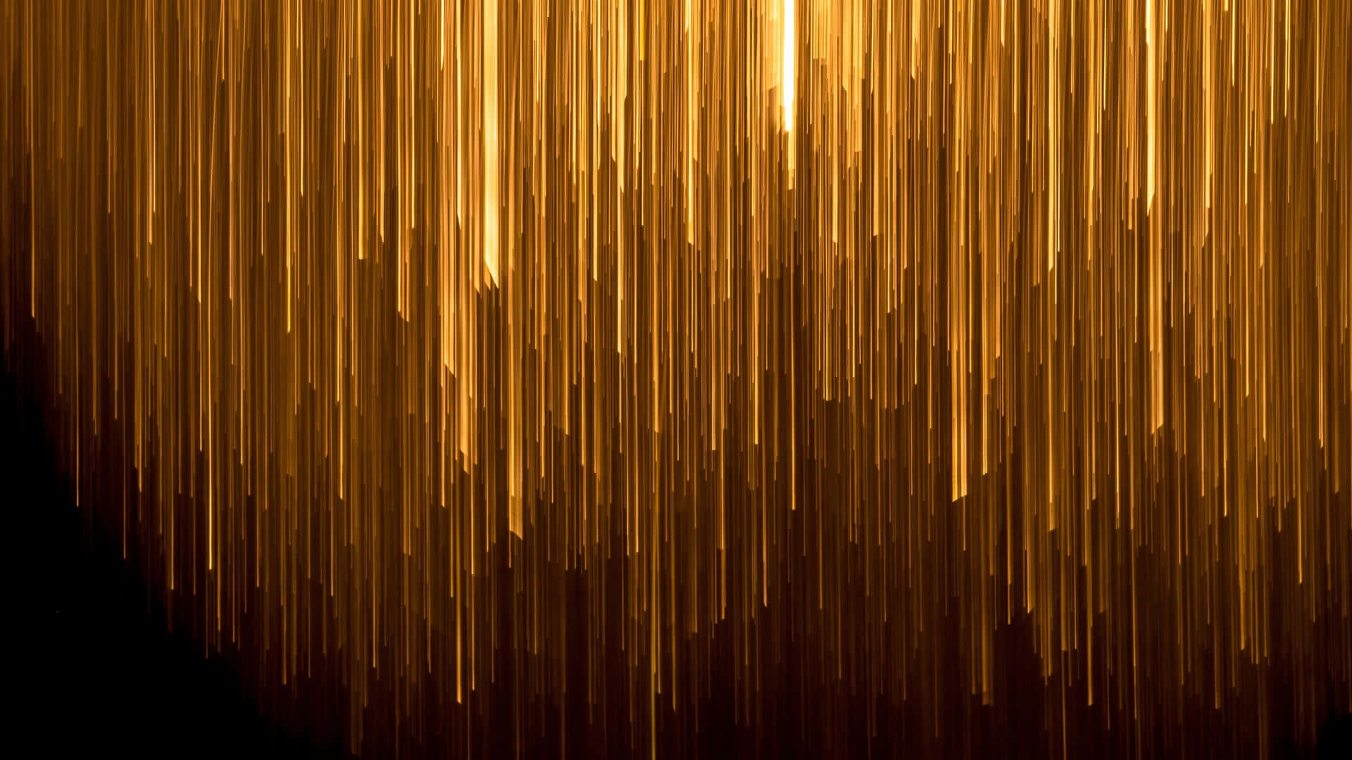 A Luxurious Black And Gold Desktop With A Sleek Design Background