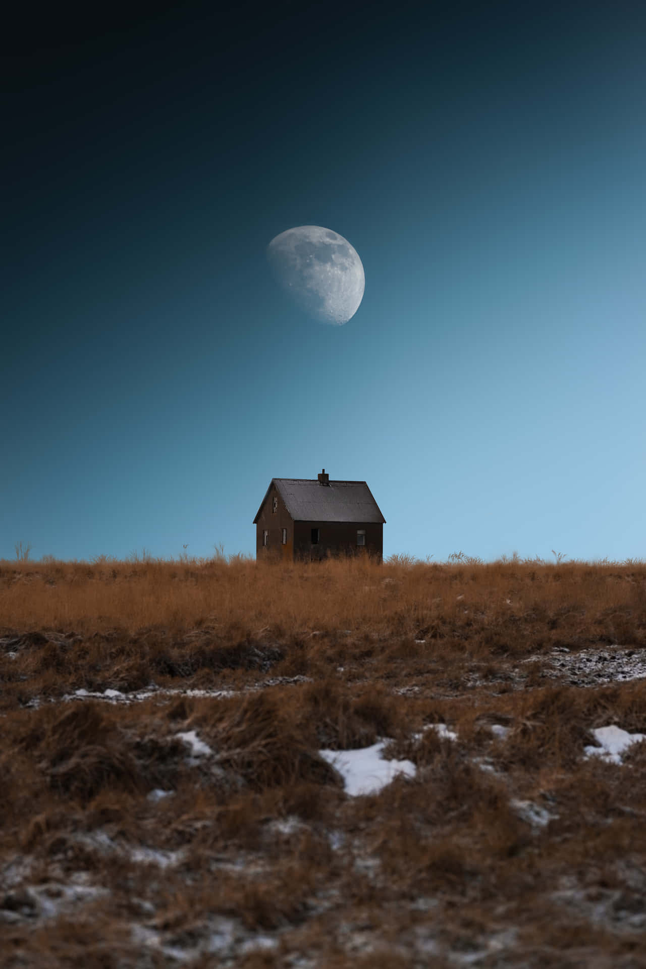 A Magical Moon Rises High In A Dark Night Sky. Background