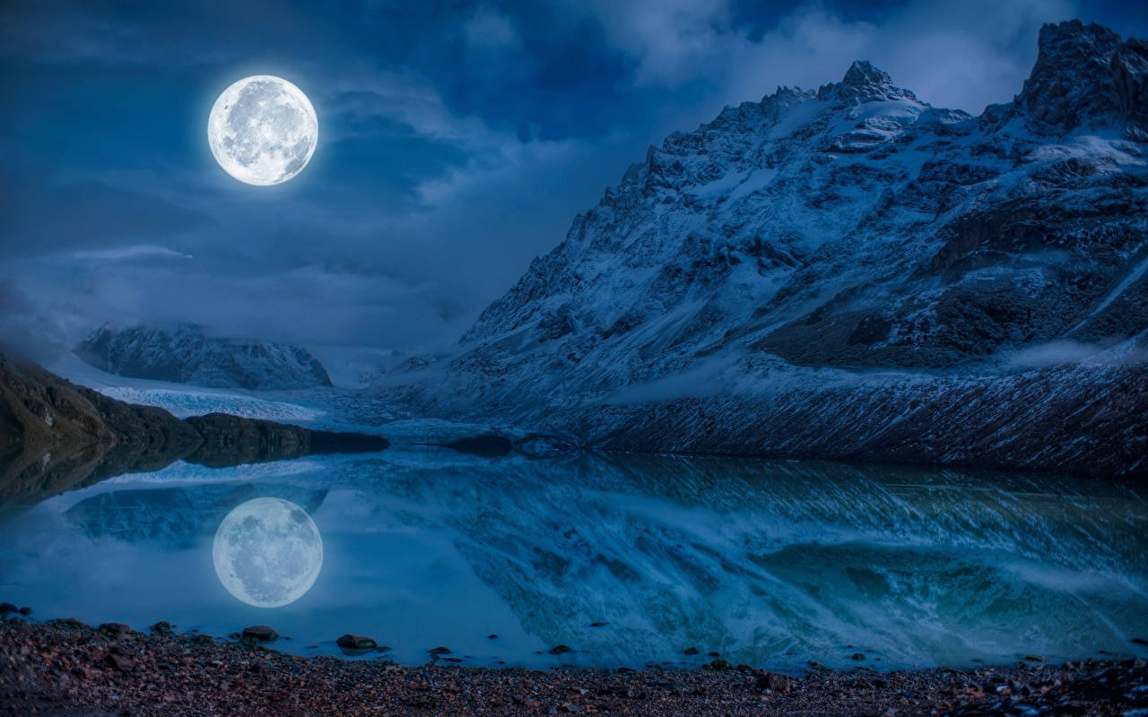 A Majestic View Of Night Mountain And The Star-filled Sky Background