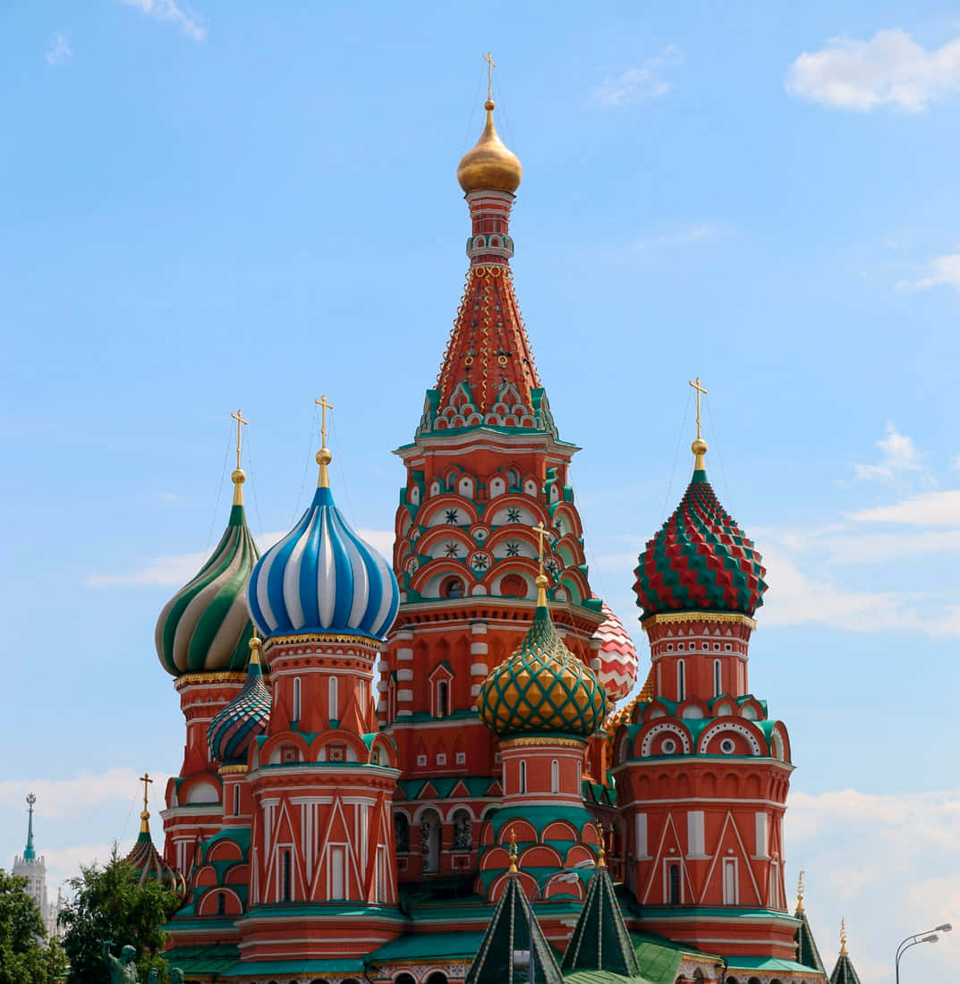 A Majestic View Of Saint Basil's Cathedral Radiant In Colorful Hues Background