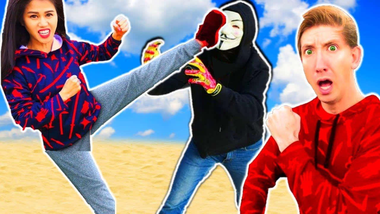 A Man And Woman Are Kicking In The Sand Background