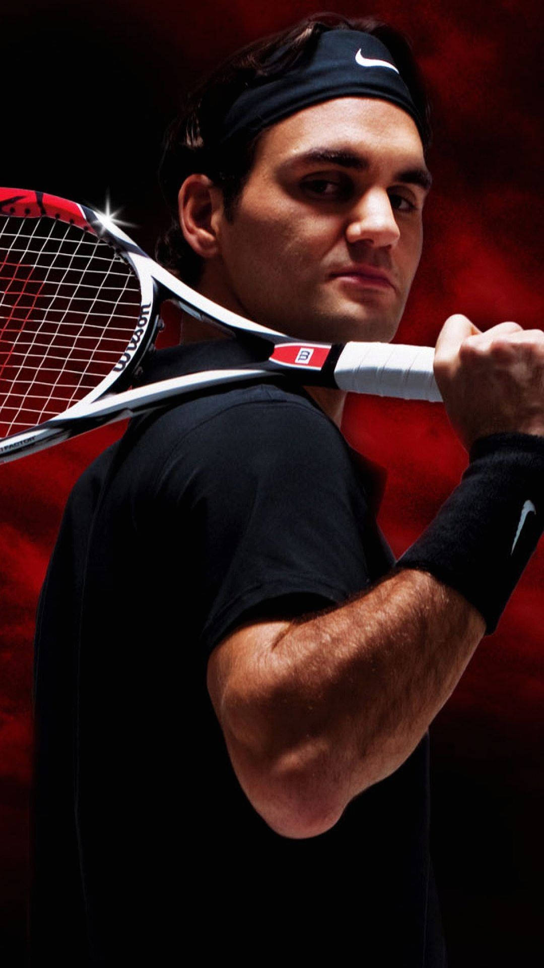 A Man Holding A Tennis Racket Background