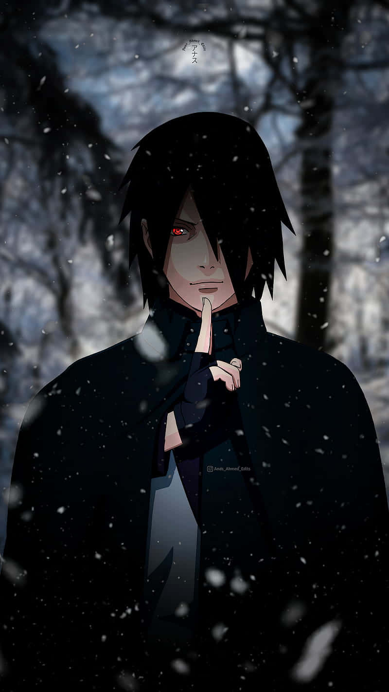 A Man In A Black Coat Is Standing In The Snow Background