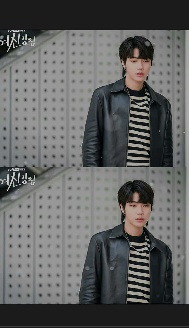 A Man In A Black Jacket And Striped Shirt Background