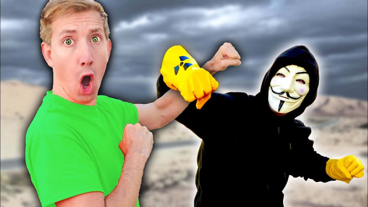 A Man In A Green Shirt And A Man In A Mask Background