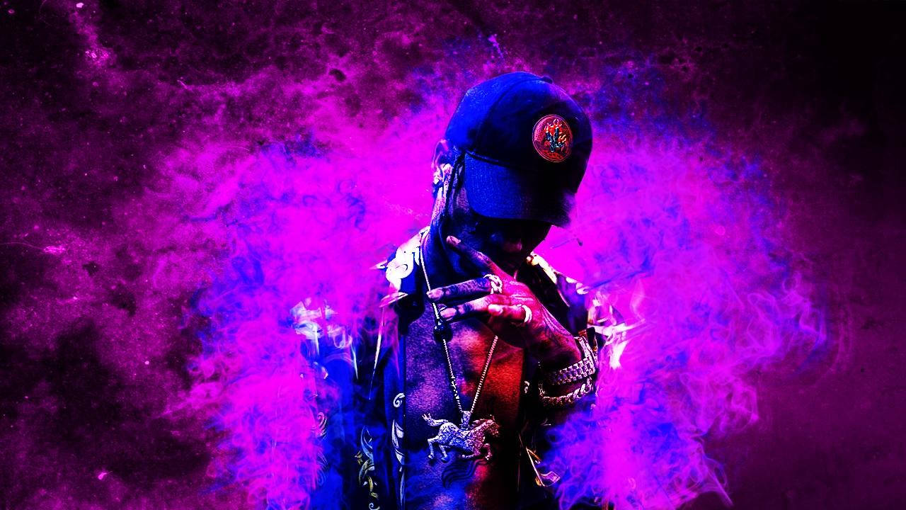 A Man In A Hat With Purple Smoke Background