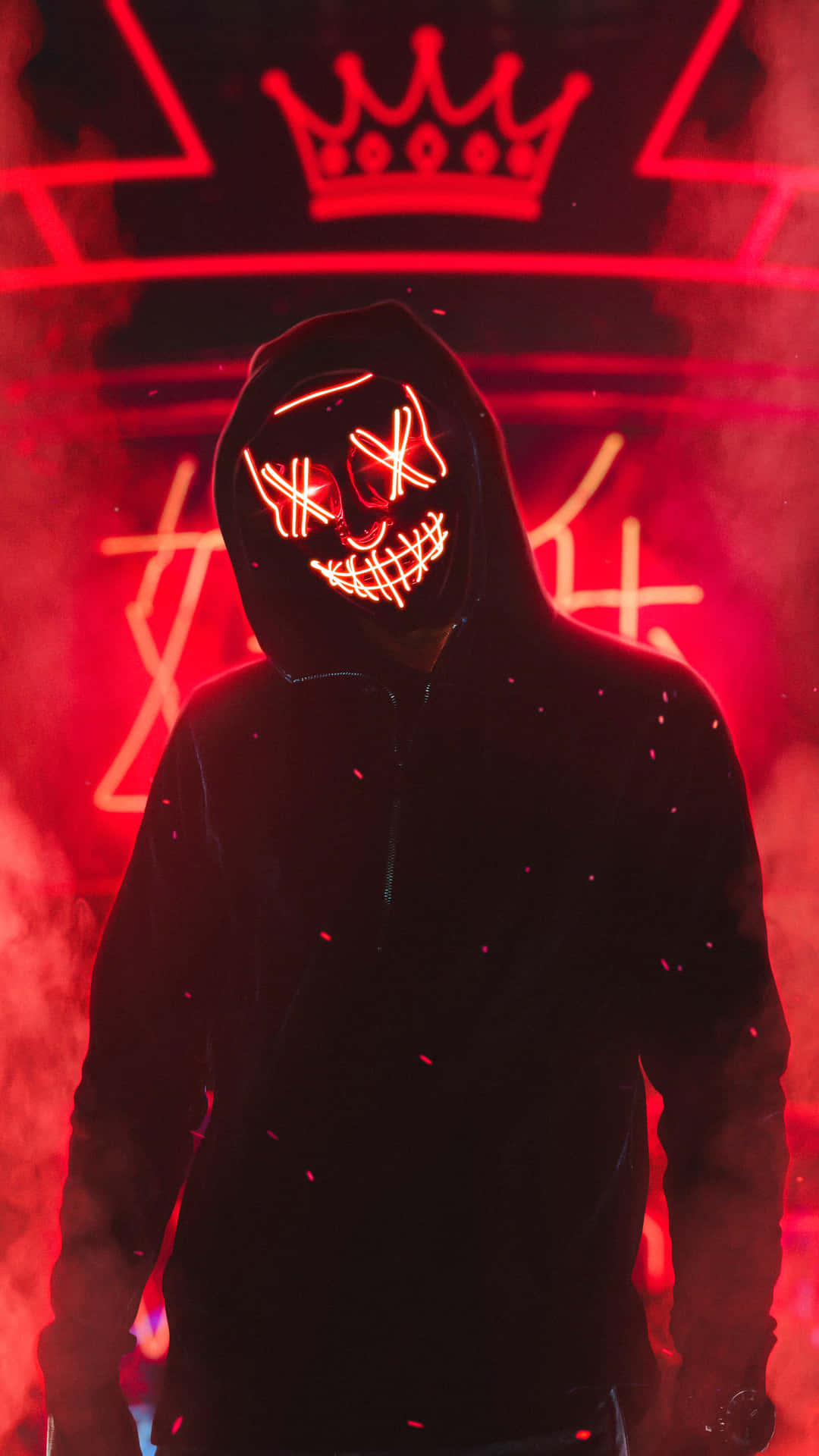 A Man In A Neon Hoodie Standing In Front Of Smoke Background