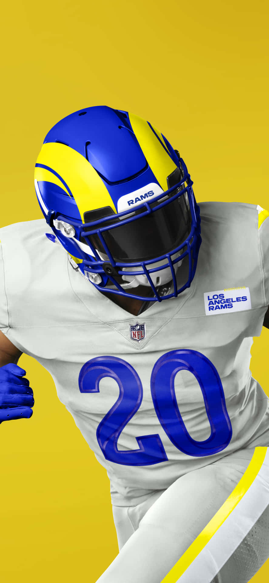 A Man In A Nfl Uniform Running Background