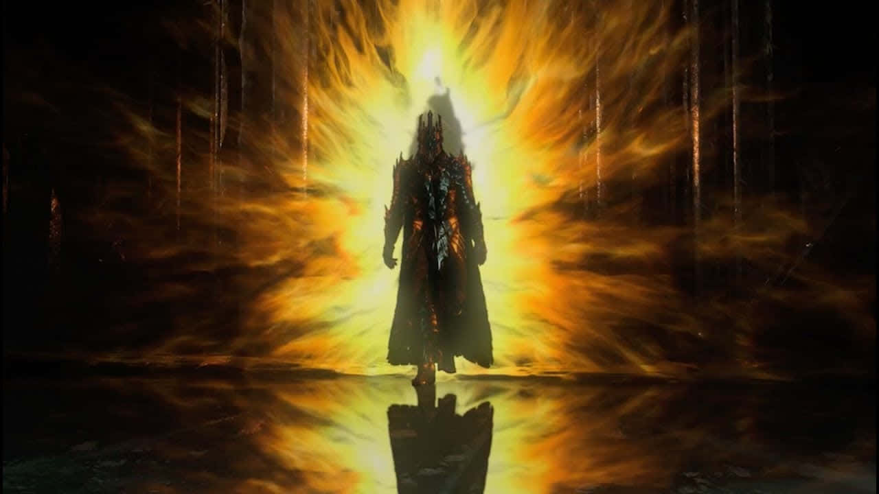 A Man In A Robe Standing In Front Of A Fire Background