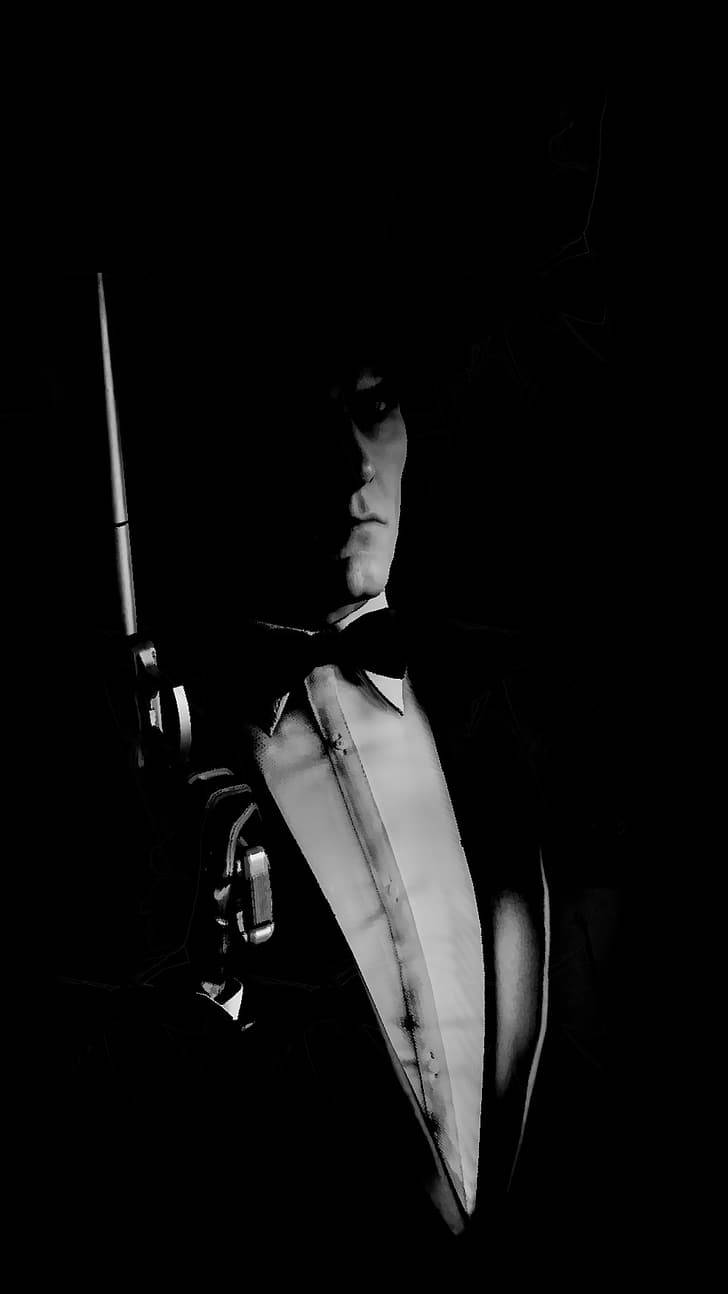 A Man In A Suit Holding A Gun Background