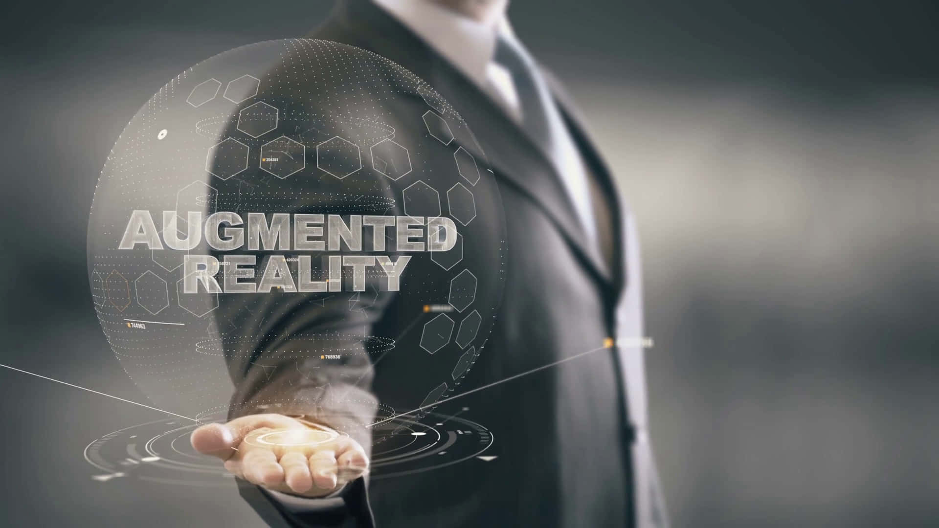 A Man In A Suit Is Holding A Virtual Reality Device Background