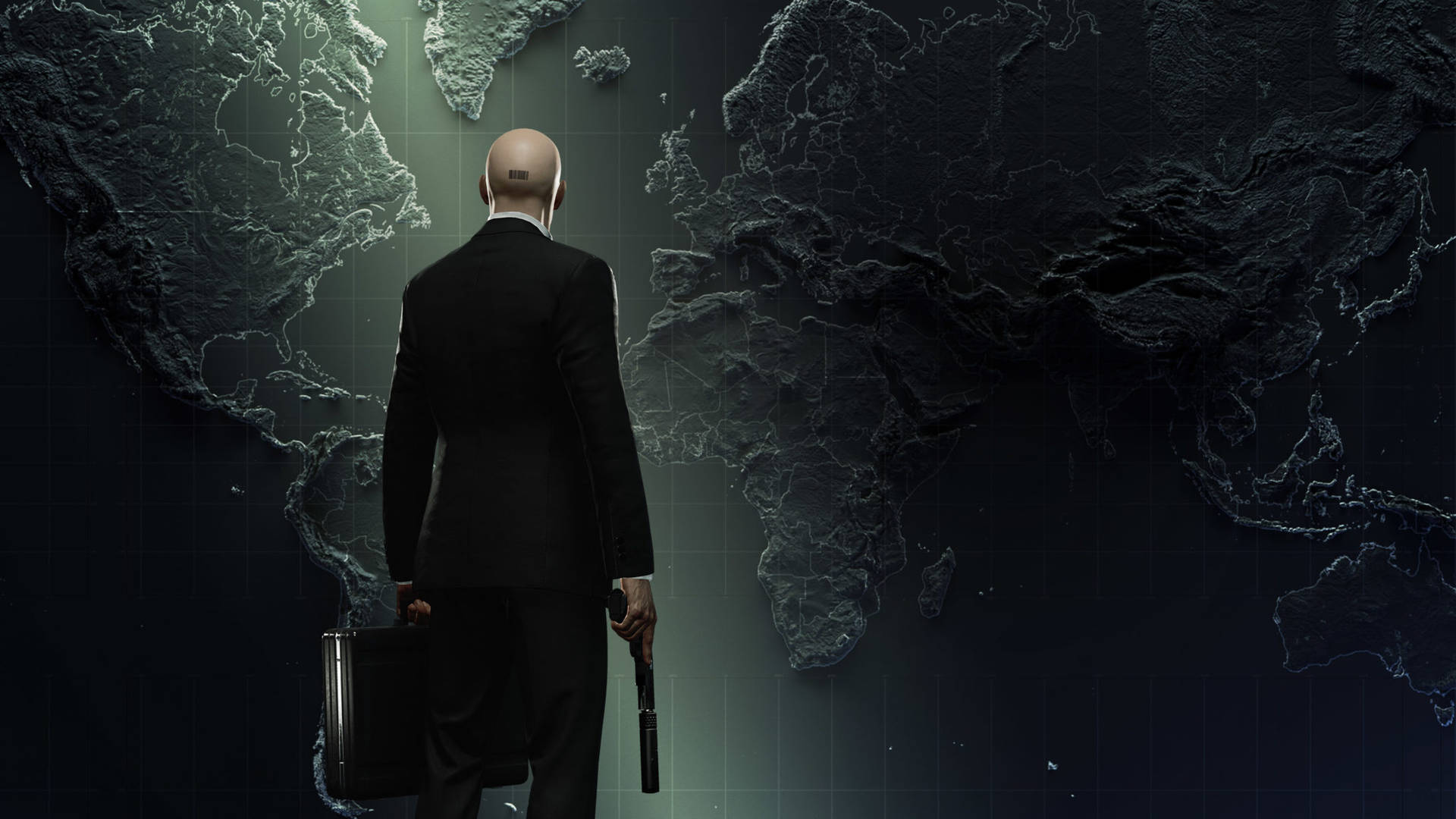 A Man In A Suit Is Standing In Front Of A World Map Background