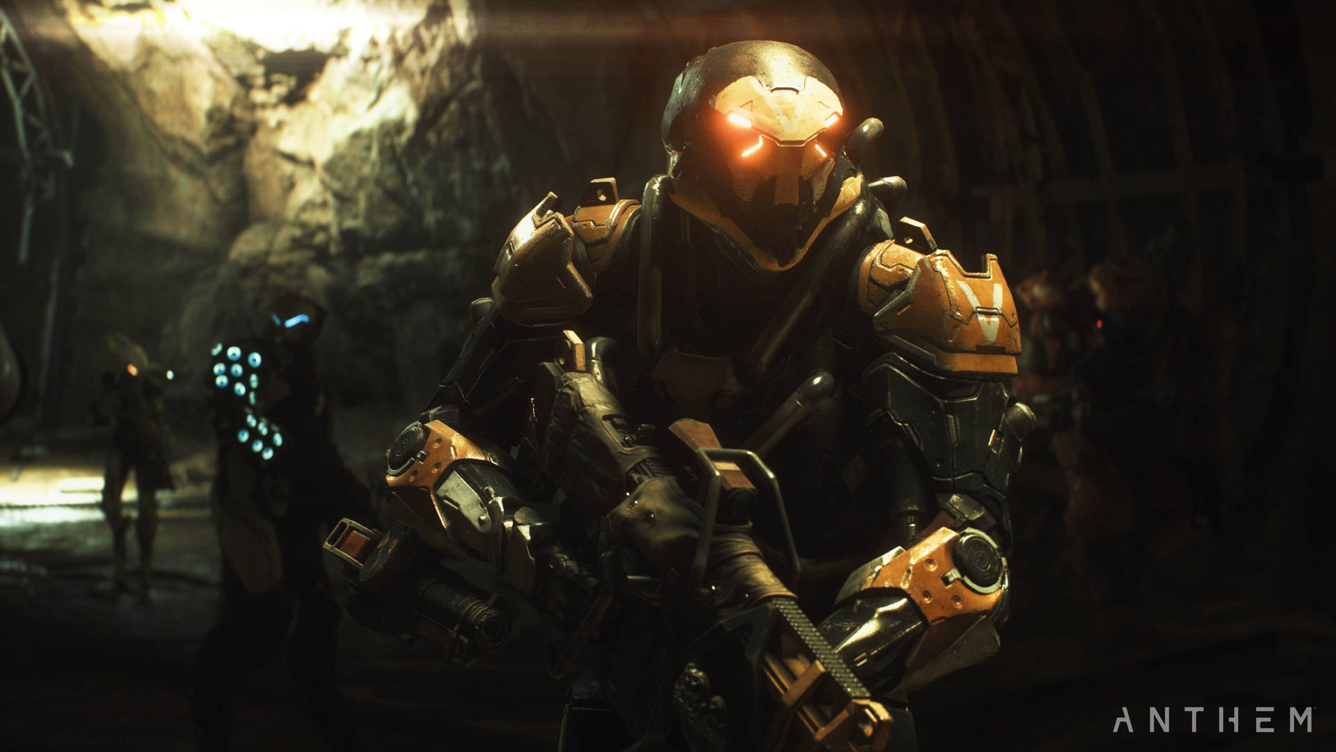 A Man In Armor Is Standing In A Dark Tunnel Background