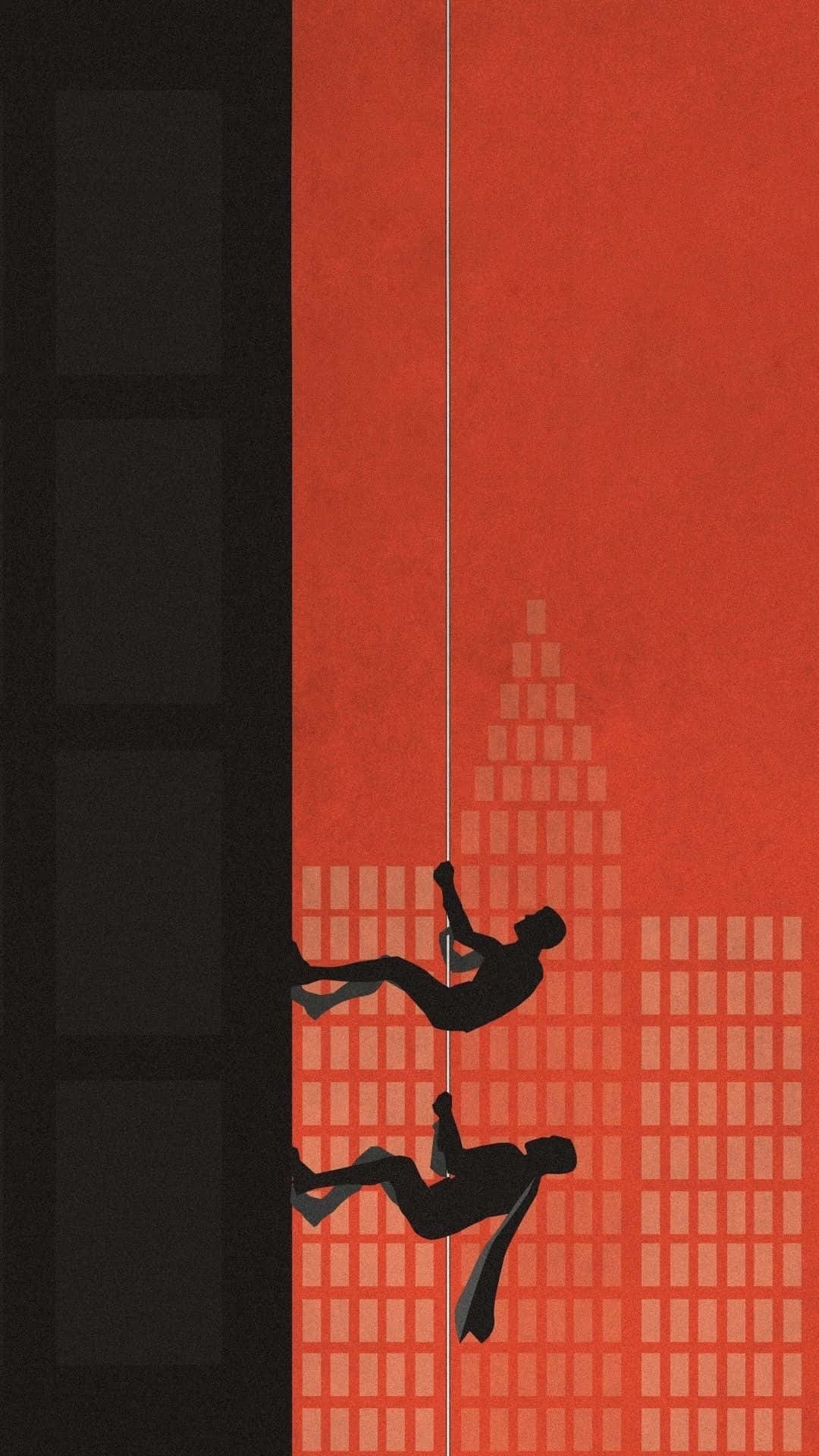 A Man Is Hanging From A Rope In A City