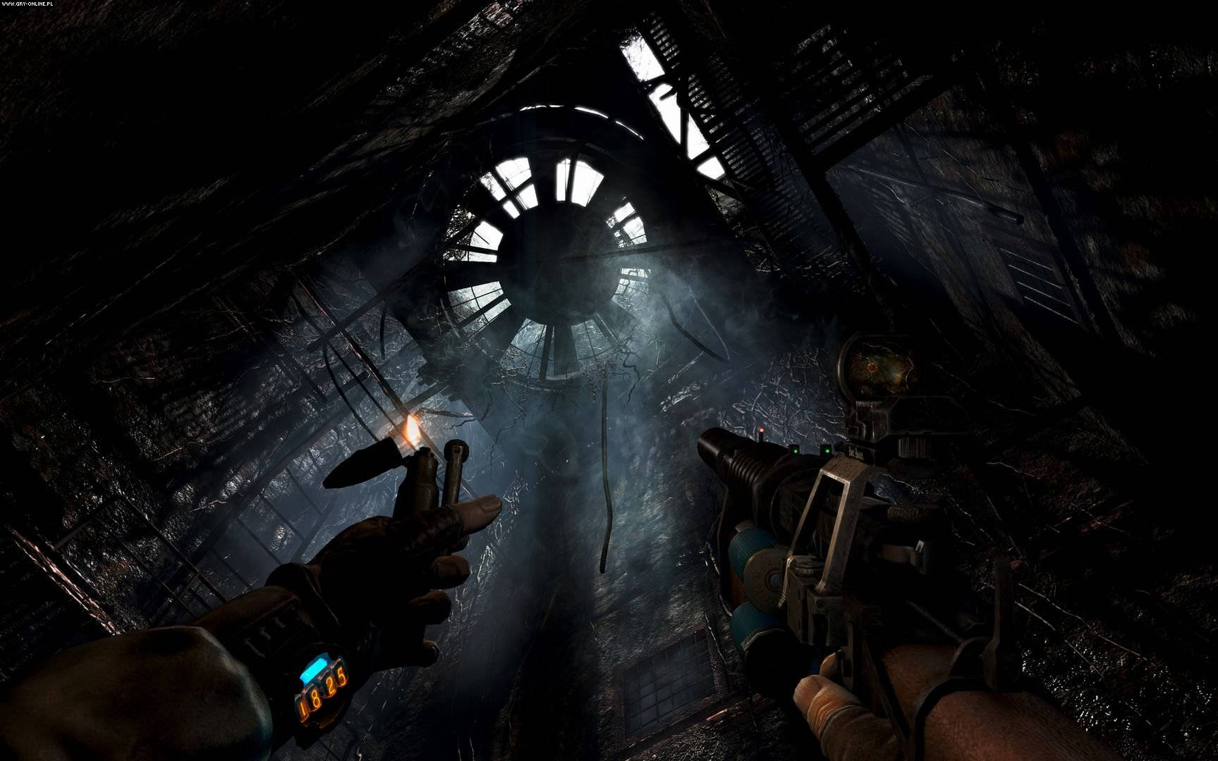 A Man Is Holding A Gun In A Dark Room Background