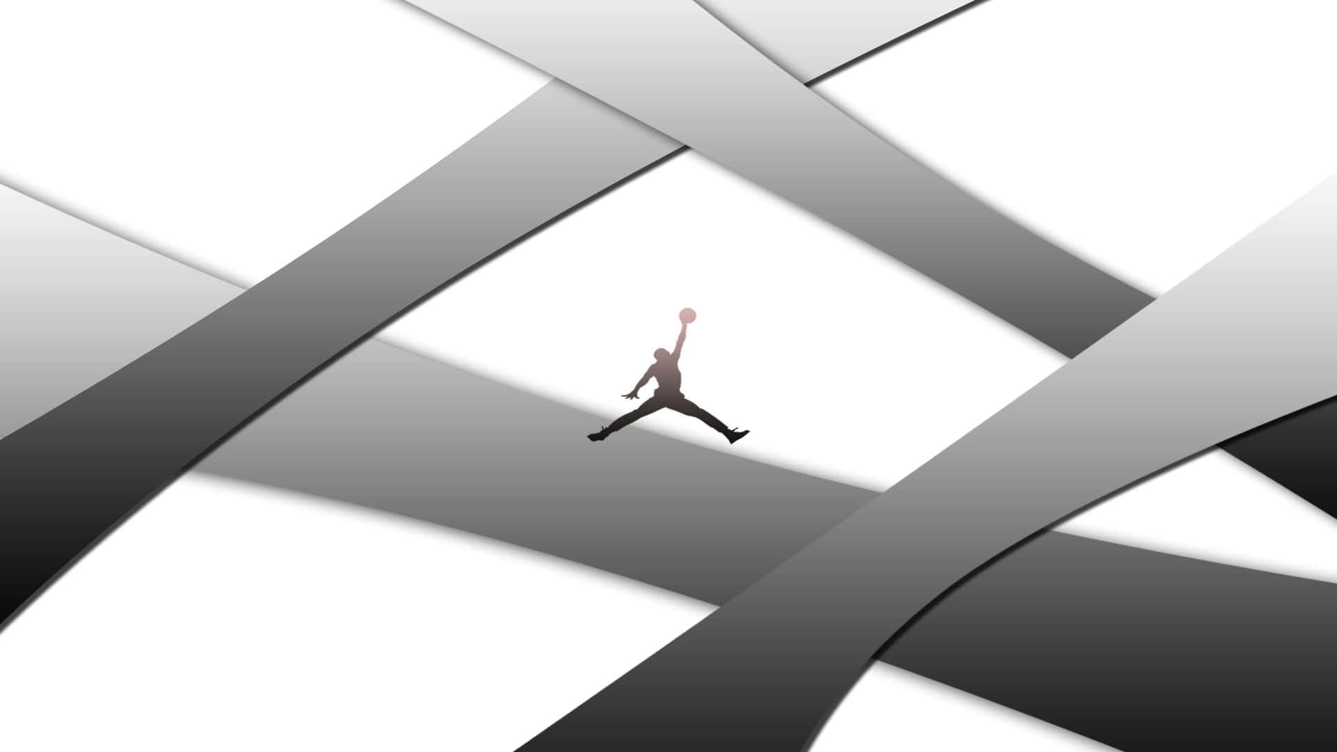 A Man Is Jumping In The Air With A Black And White Background Background