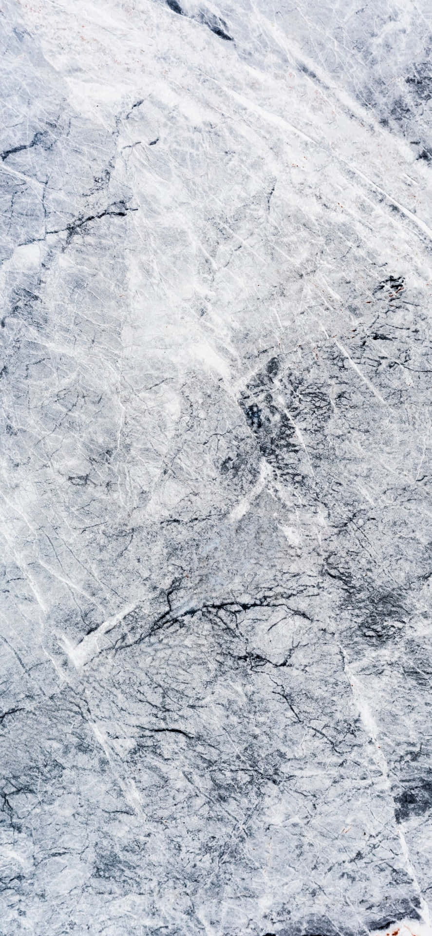 A Man Is Riding A Snowboard On A Snowy Surface Background