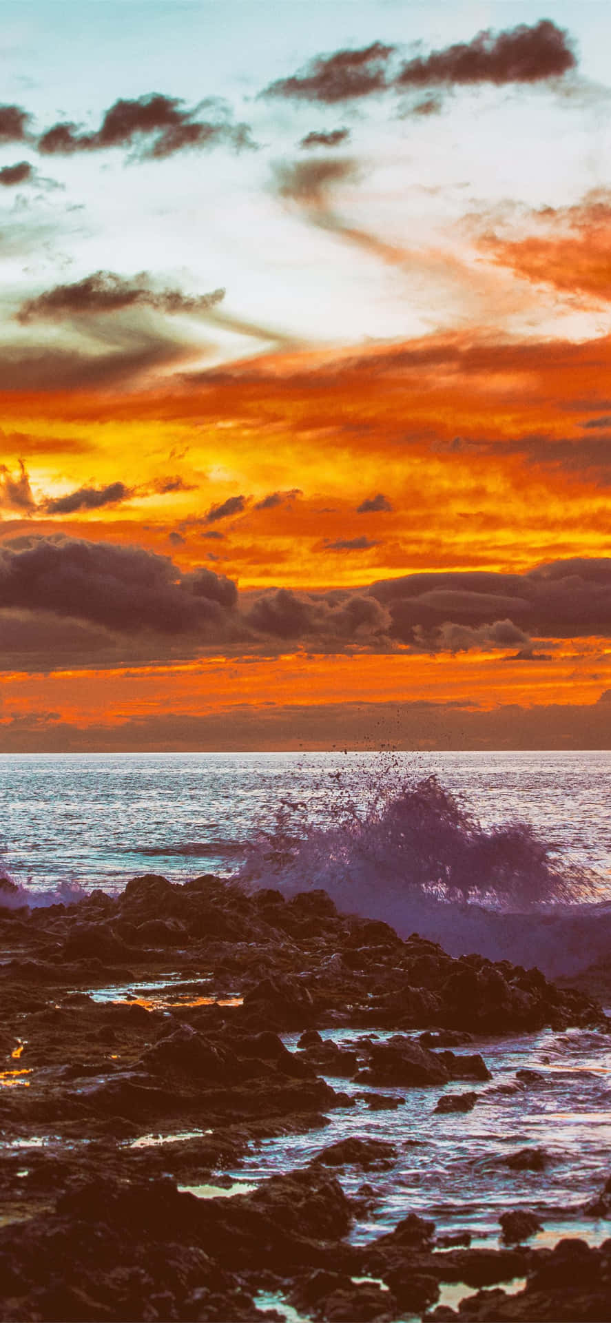 A Man Is Riding A Surfboard On The Beach Background