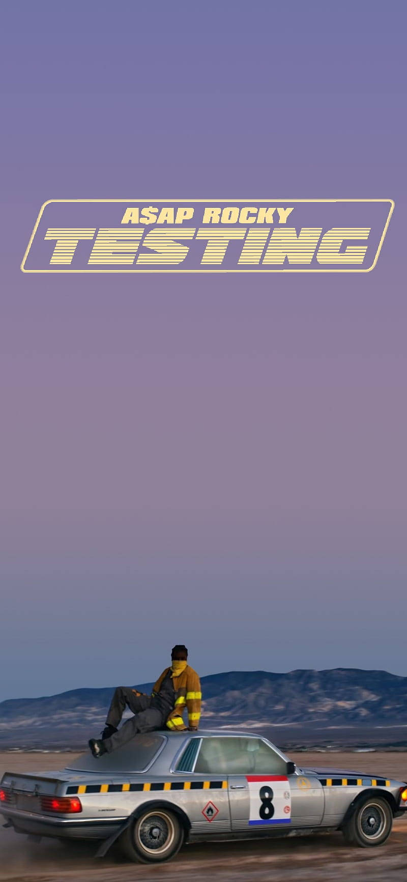 A Man Is Sitting On Top Of A Car With The Words Testing Background