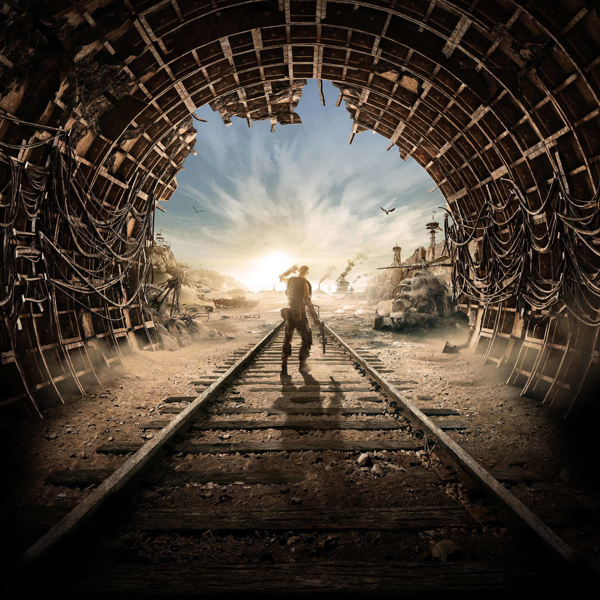 A Man Is Standing In A Tunnel With A Train Background