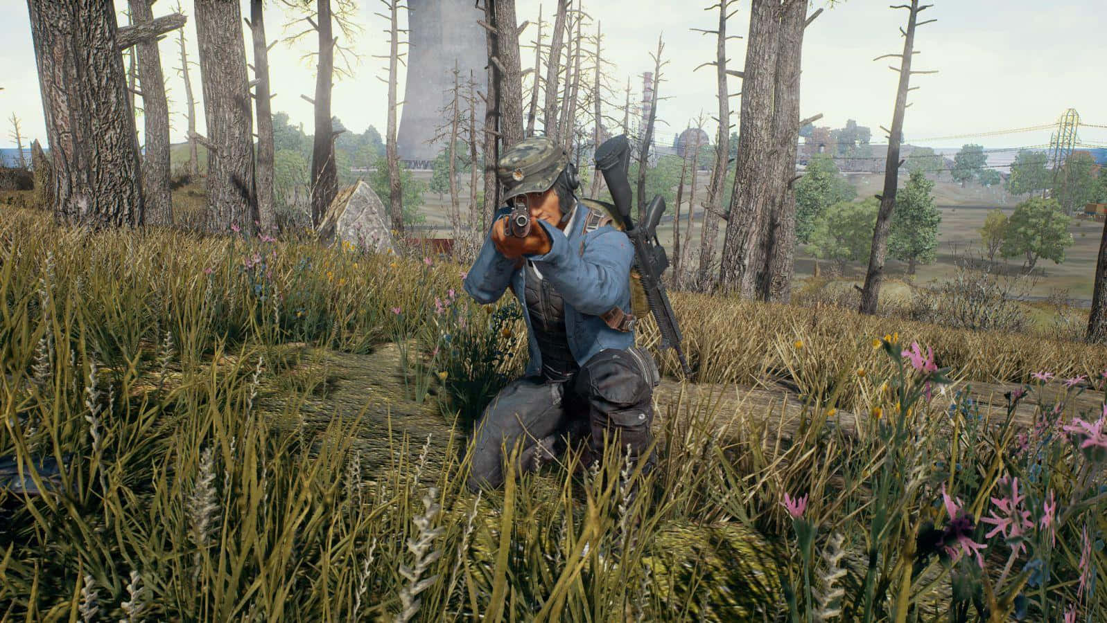 A Man Is Standing In The Grass With A Gun Background