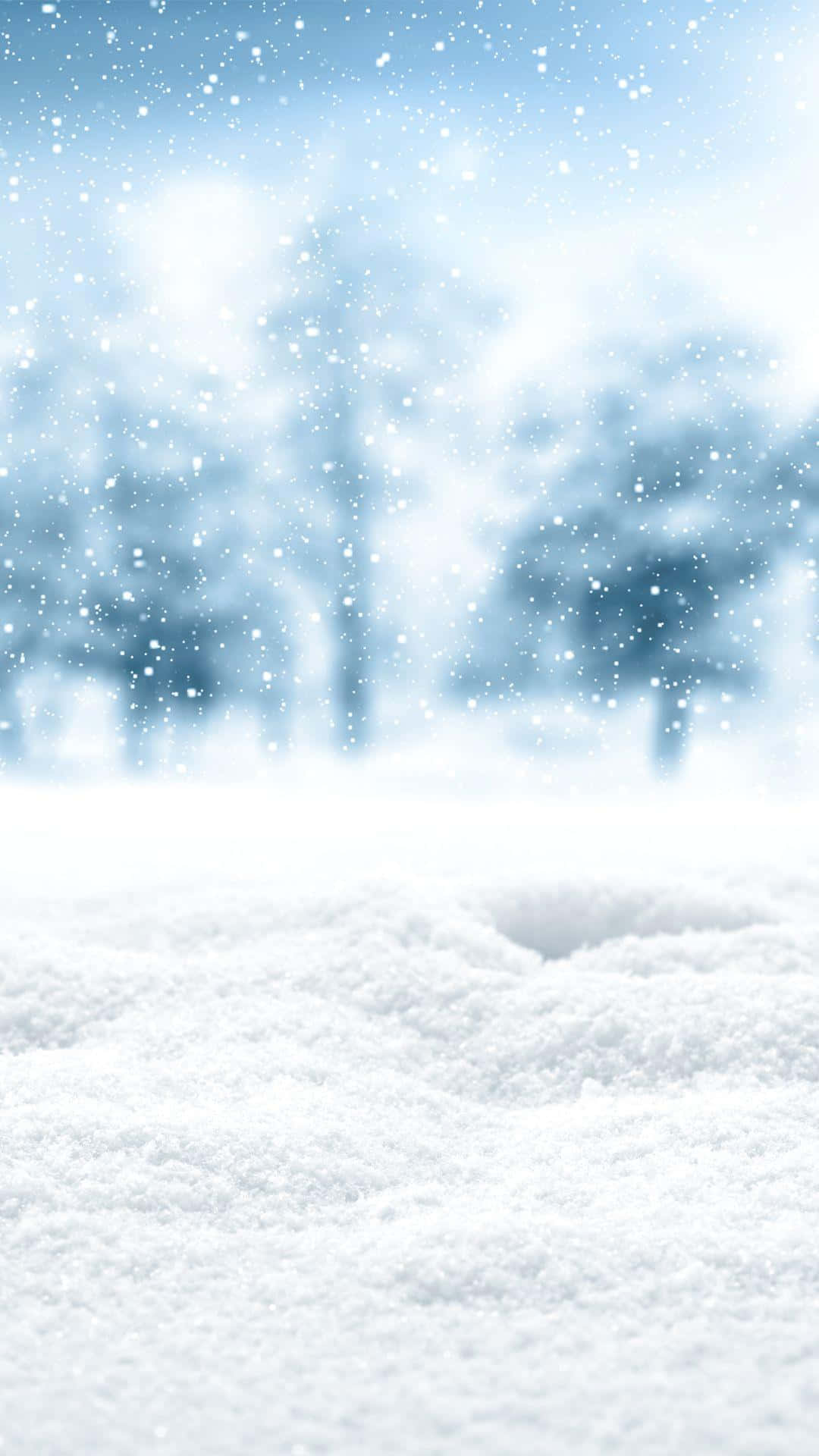 A Man Is Standing In The Snow With A Snow Shovel